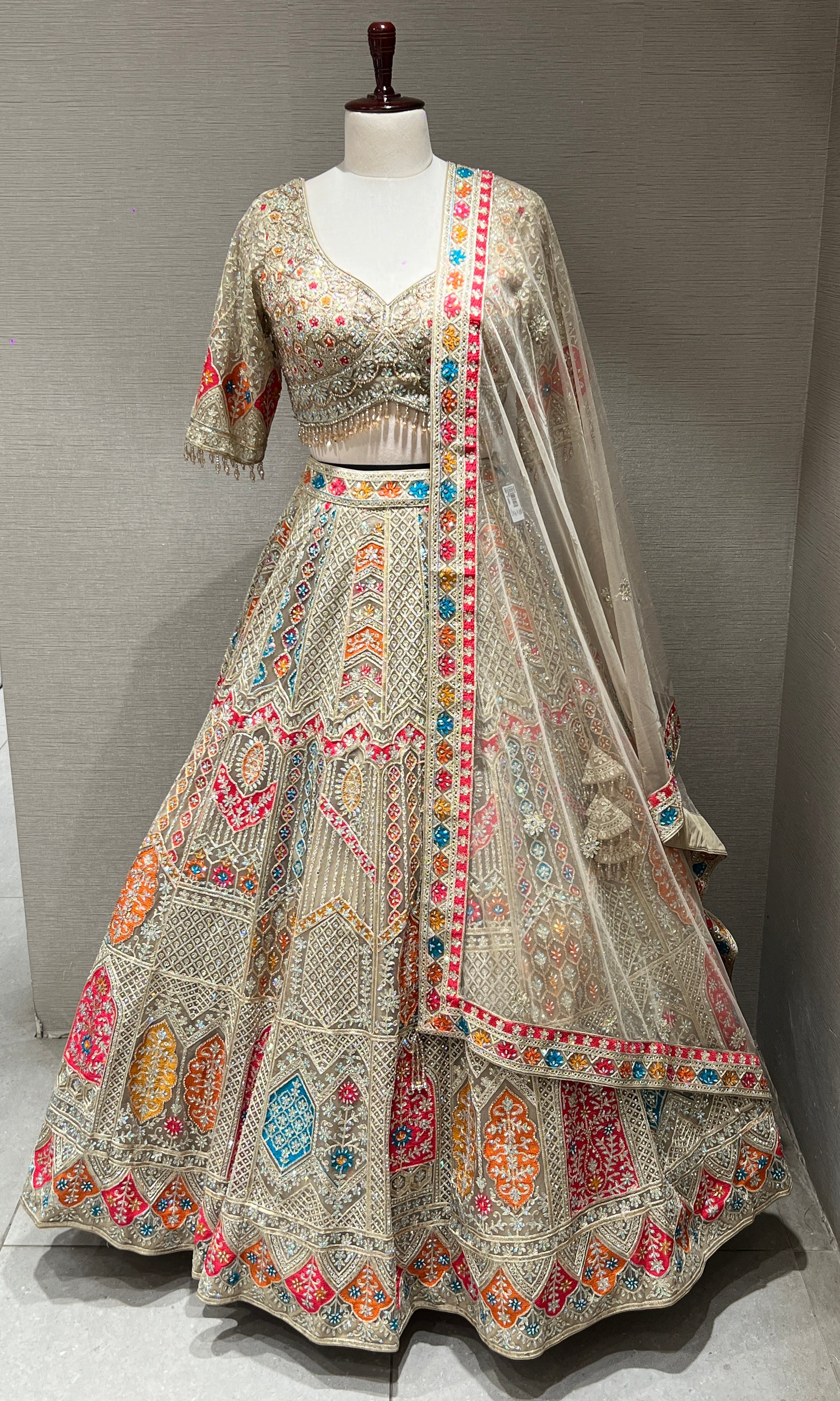 Chikoo Lehenga with Multi Color intricate embroidery