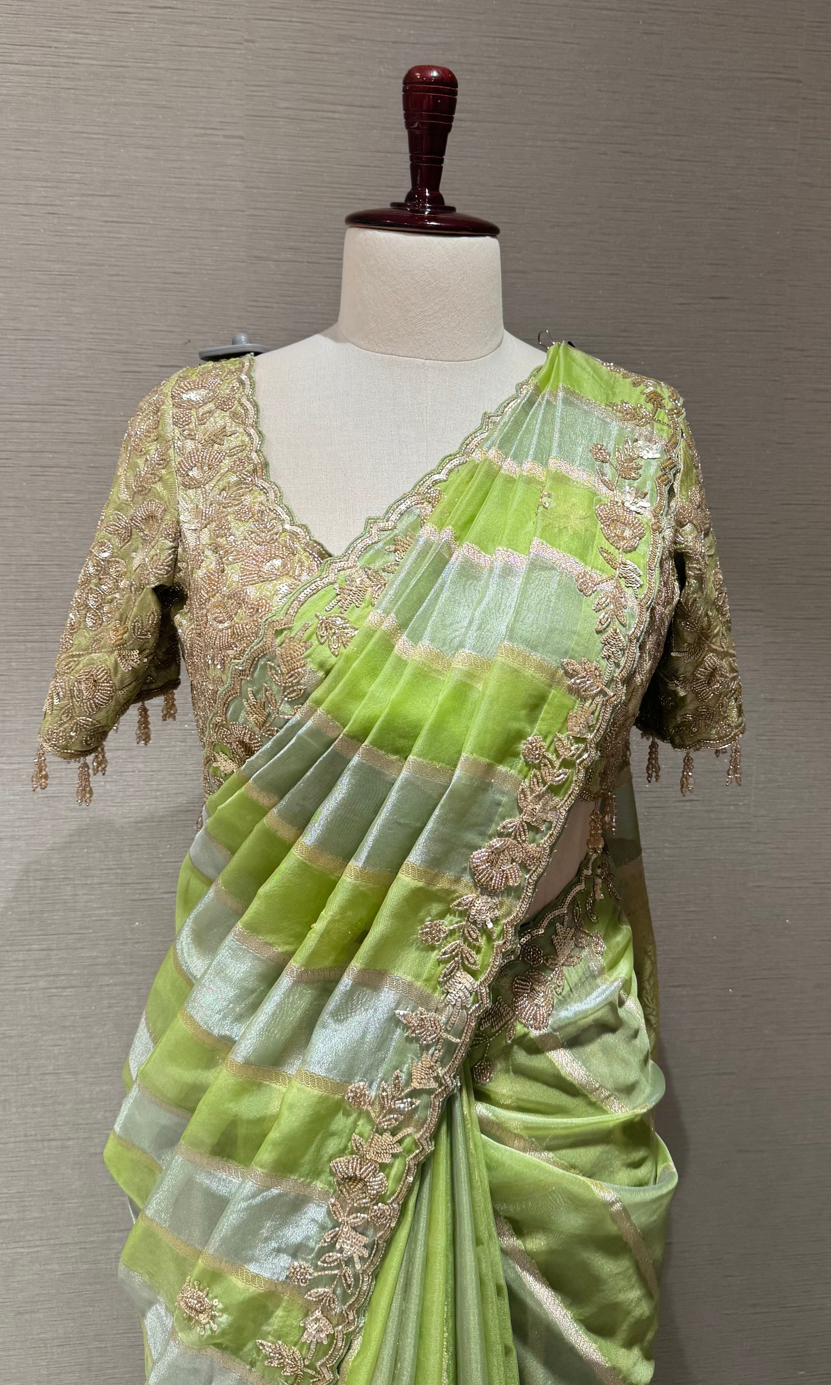 Green designer saree with embroidered blouse
