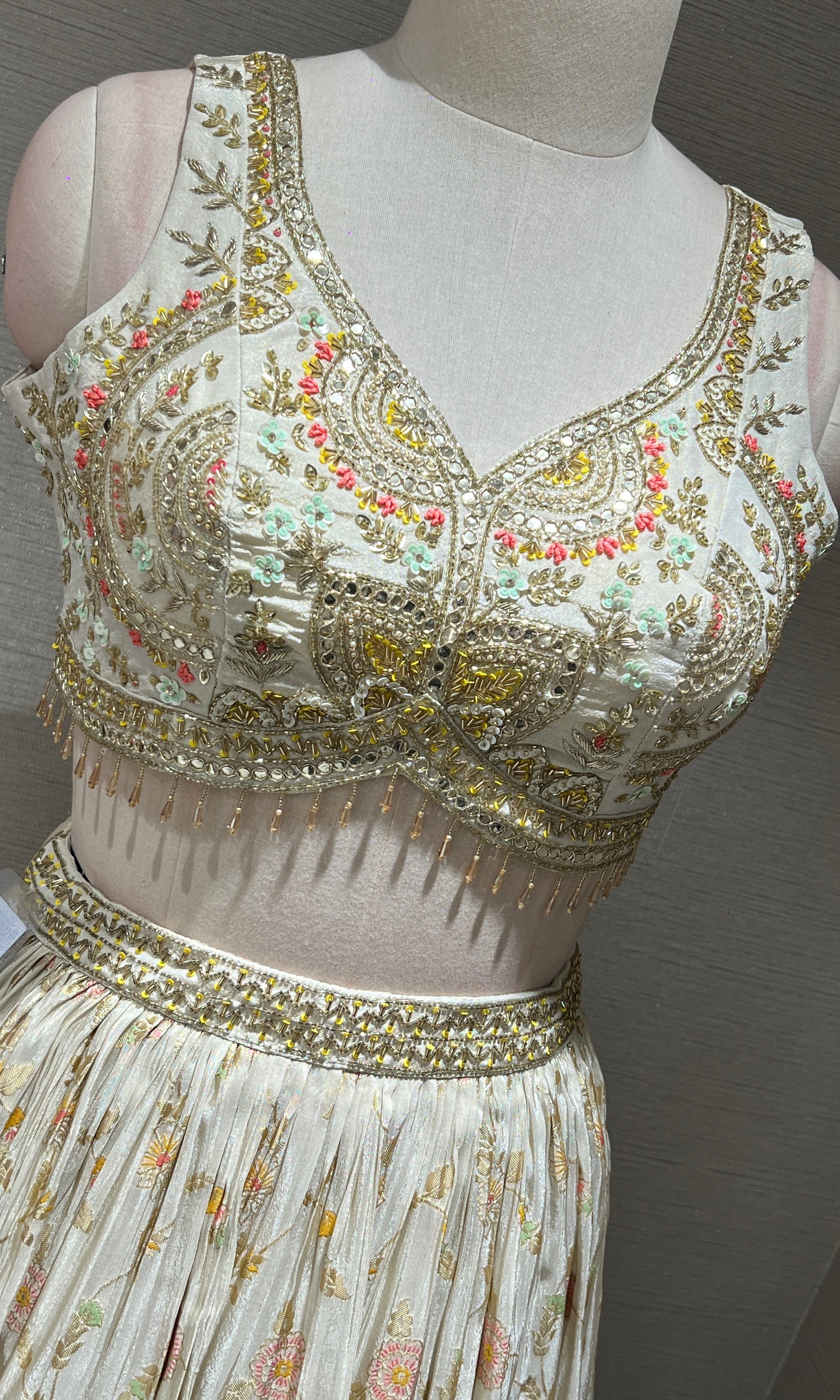 Half white Floral embroidred Lehenga with Golden Border