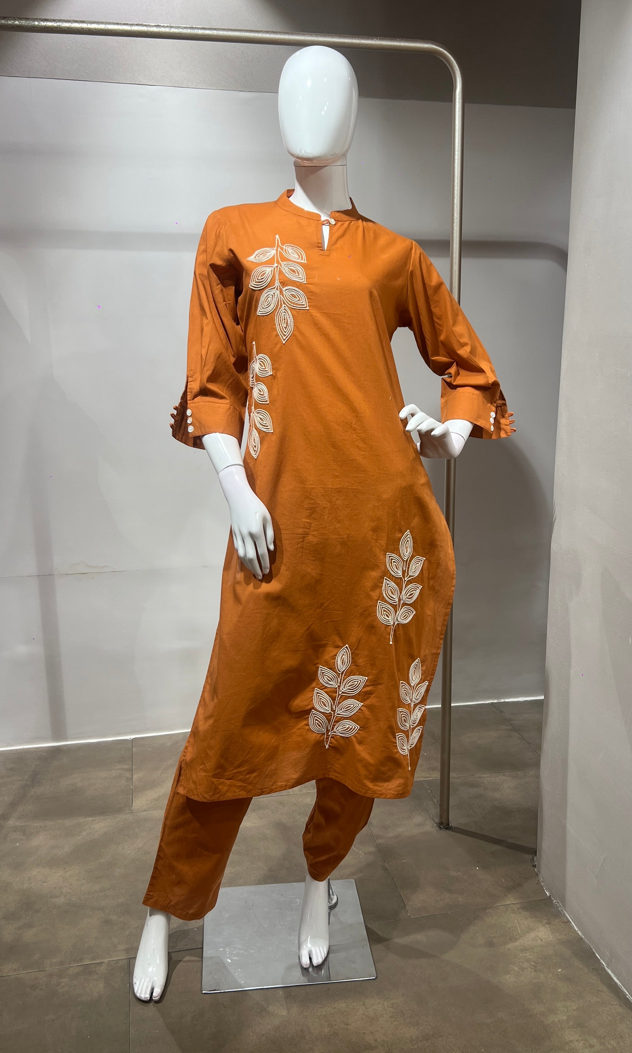 Orange leaf cotton kurta set with tassal dupatta