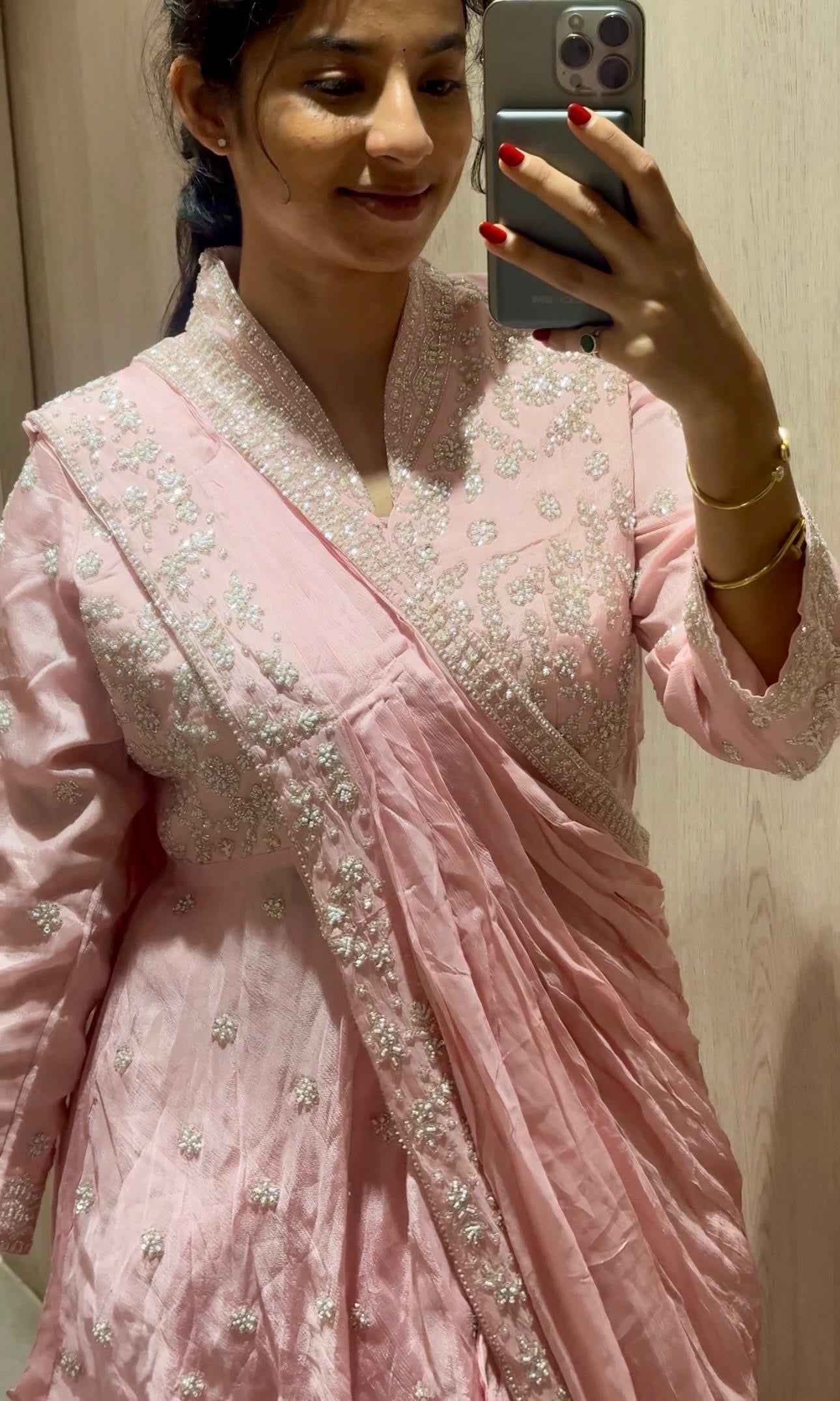 Pink pre drape saree with intricate stone work