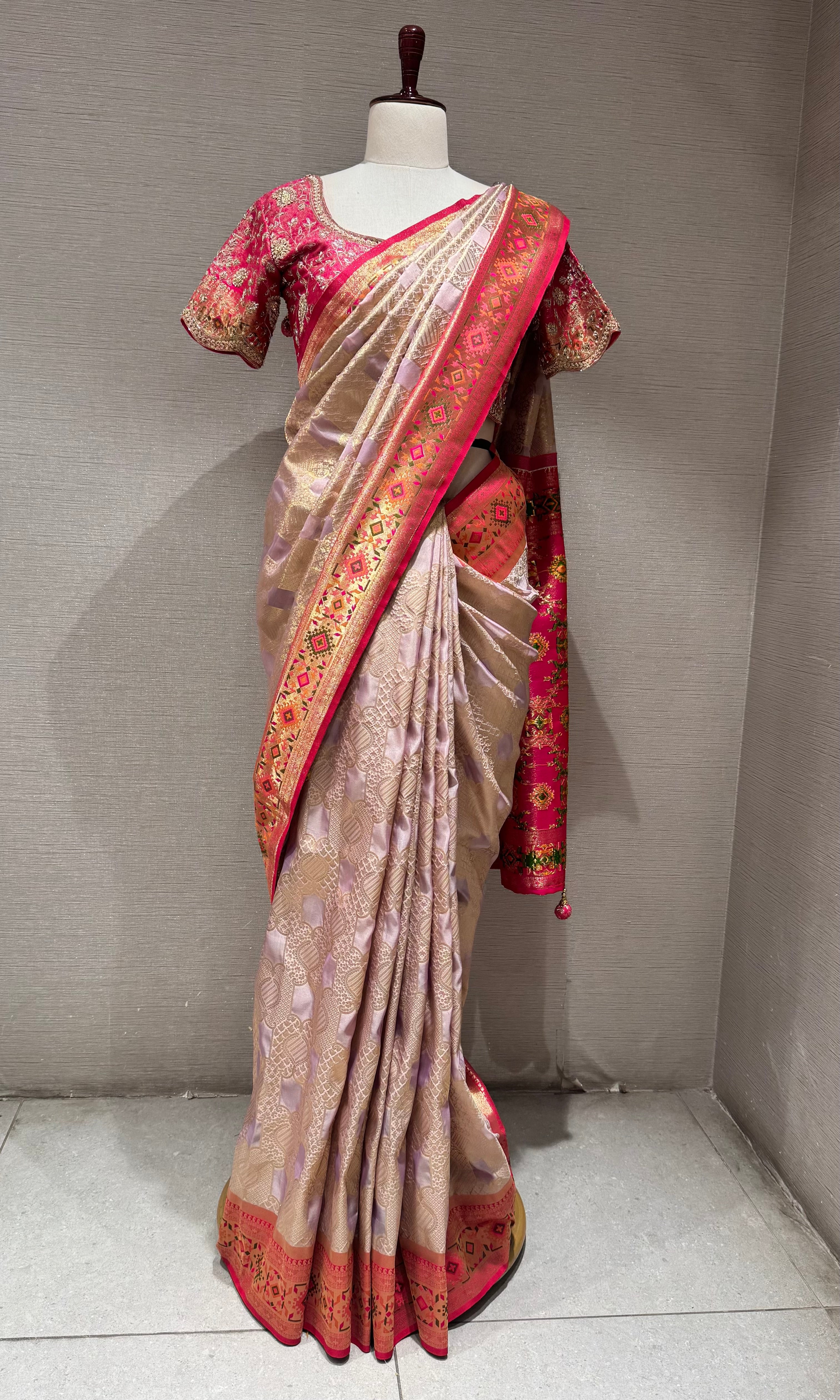 pink Kanchipuram silk saree with embroidered blouse