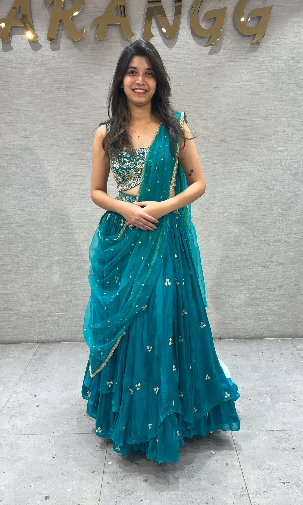 Teal blue gold zari embroidered lehenga