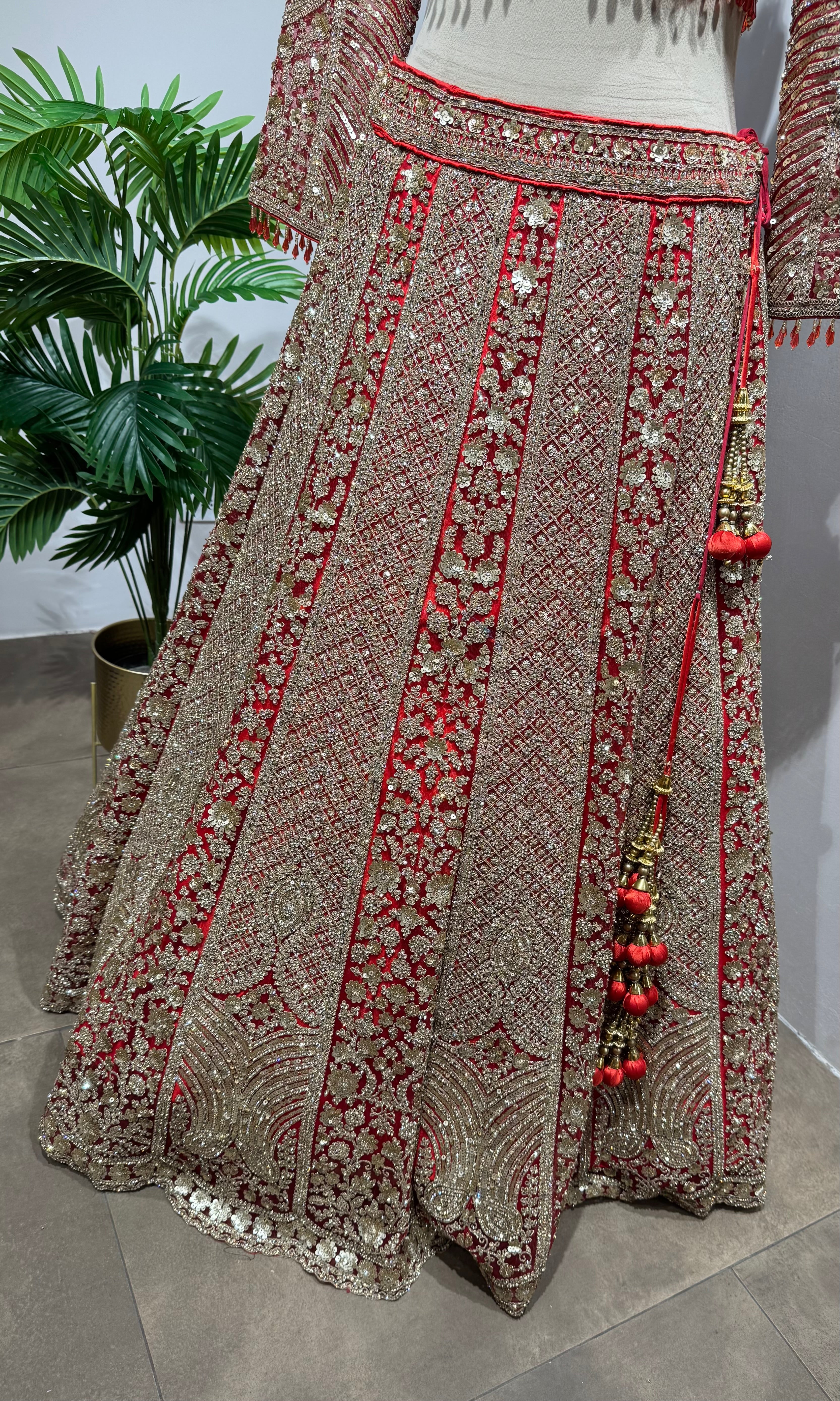 Red golden embroidery bridal lehenga
