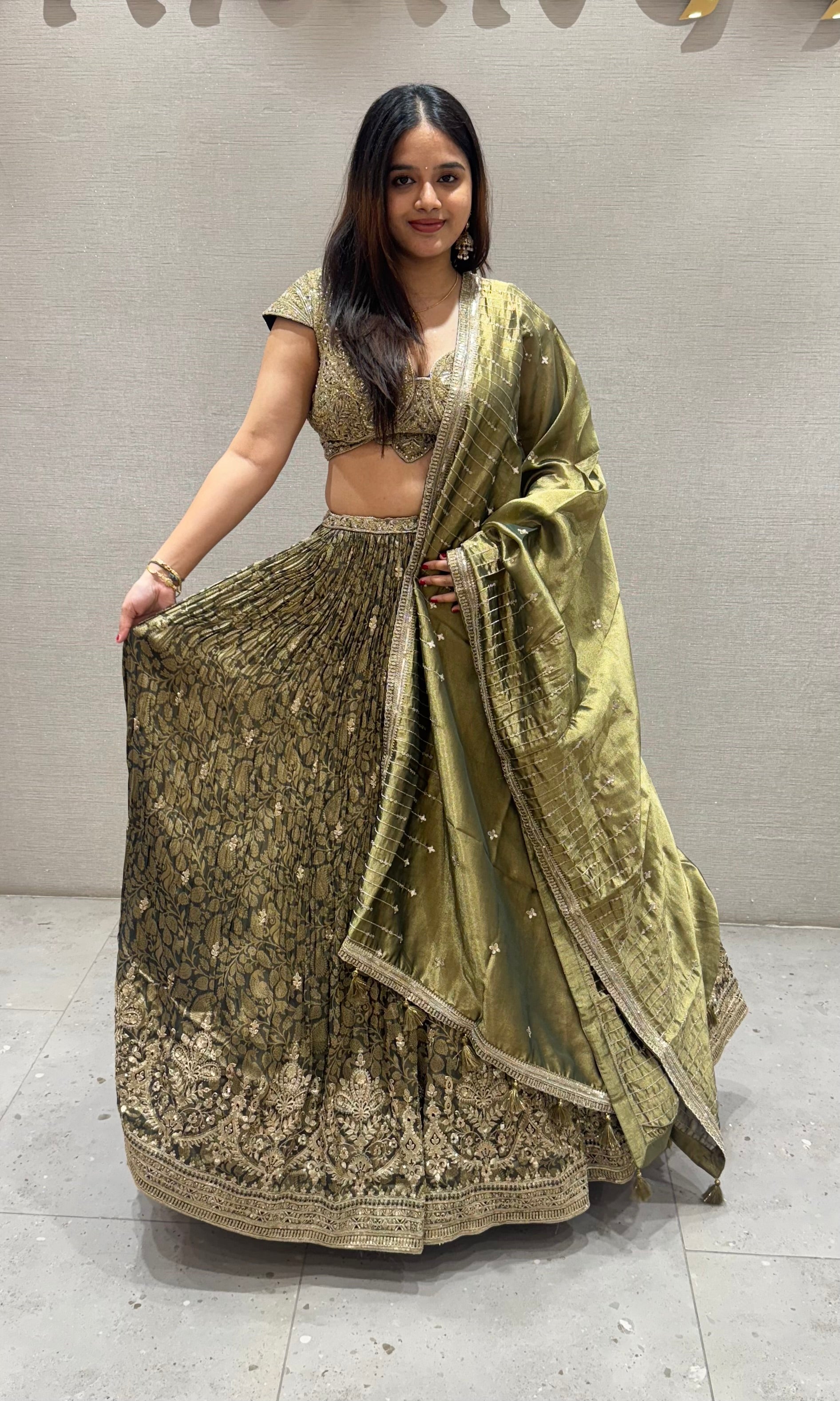 Emerald green crushed lehenga with tissue gold