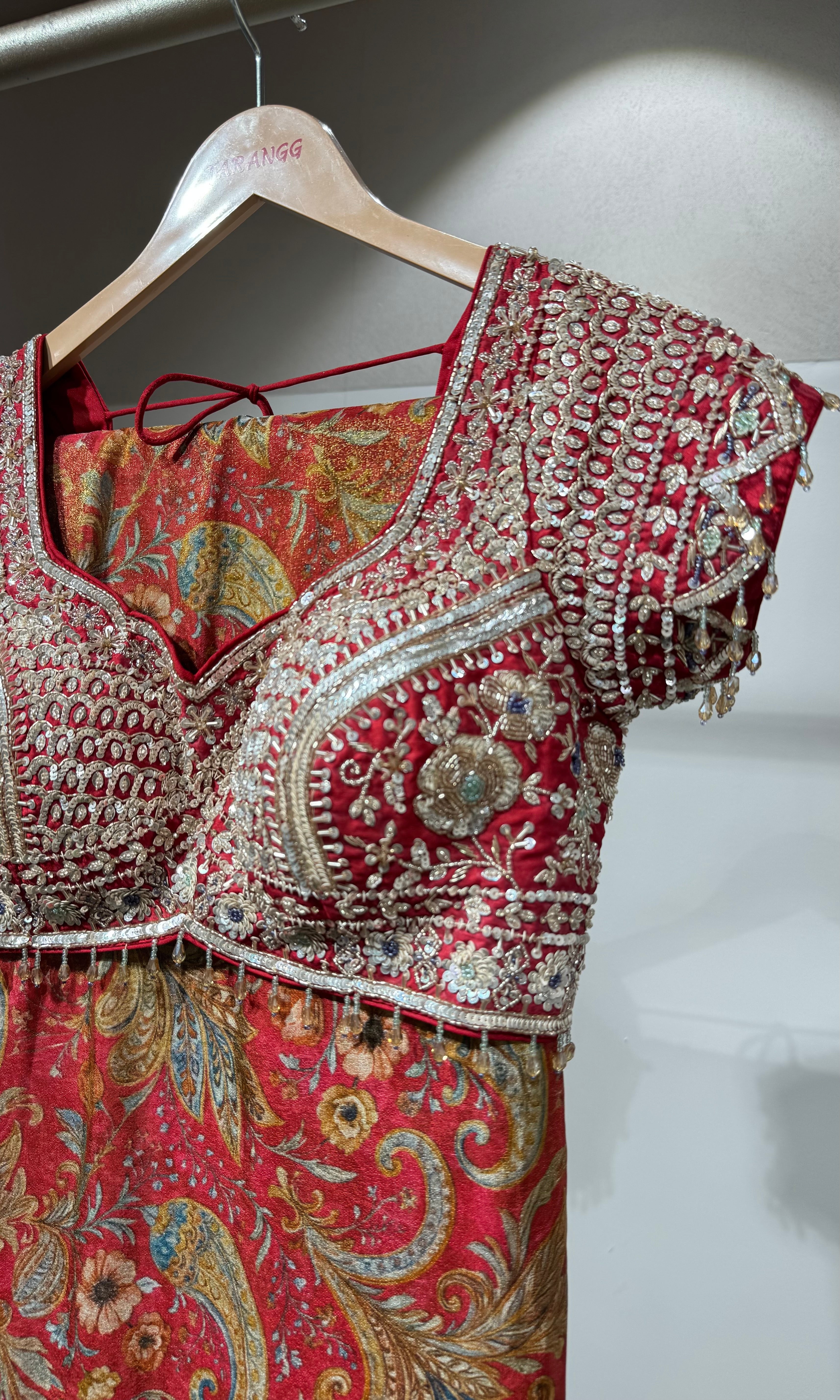 Red DESIGNED saree with EMBROIDERED blouse