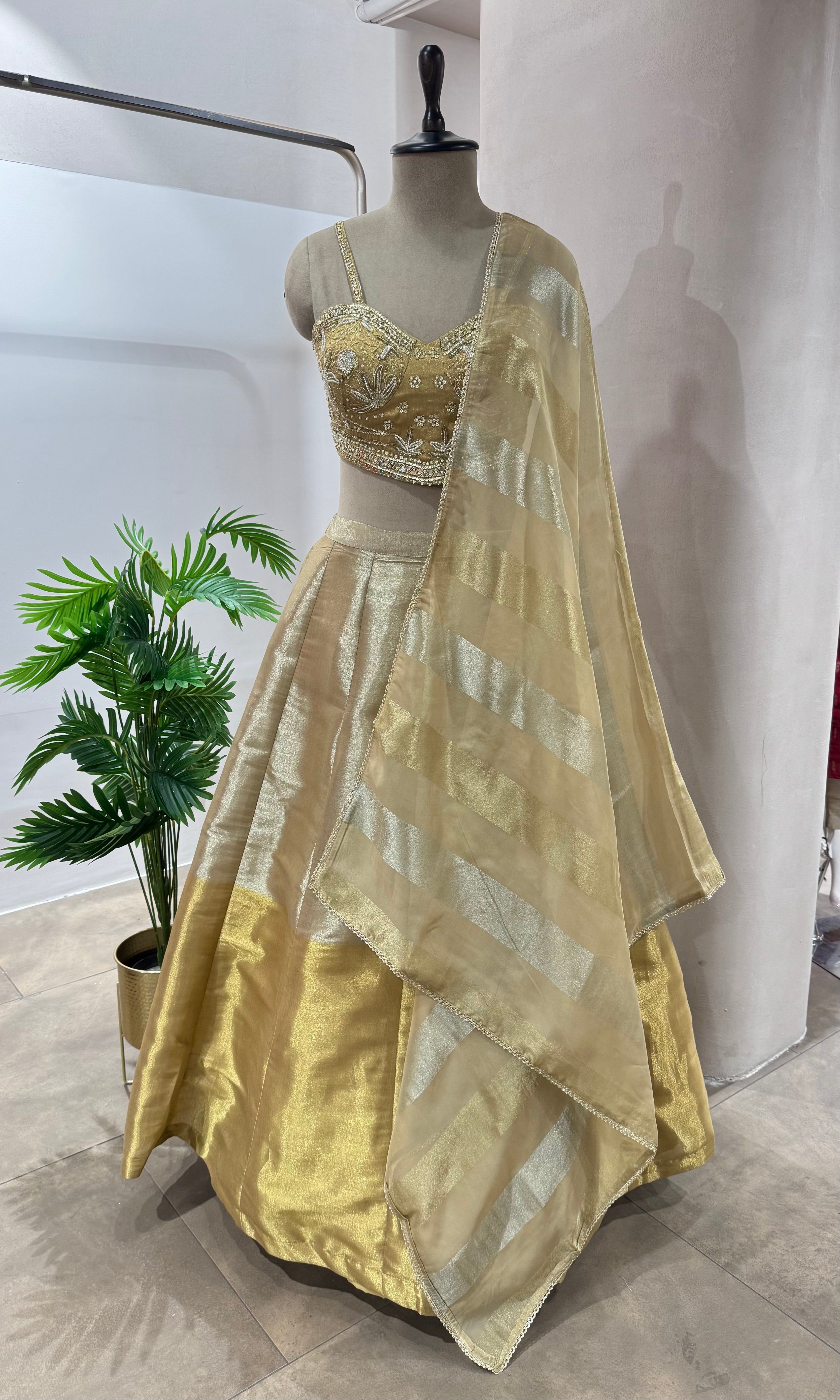 GOLDEN LEHENGA WITH EMBROIDERED CORSET BLOUSE