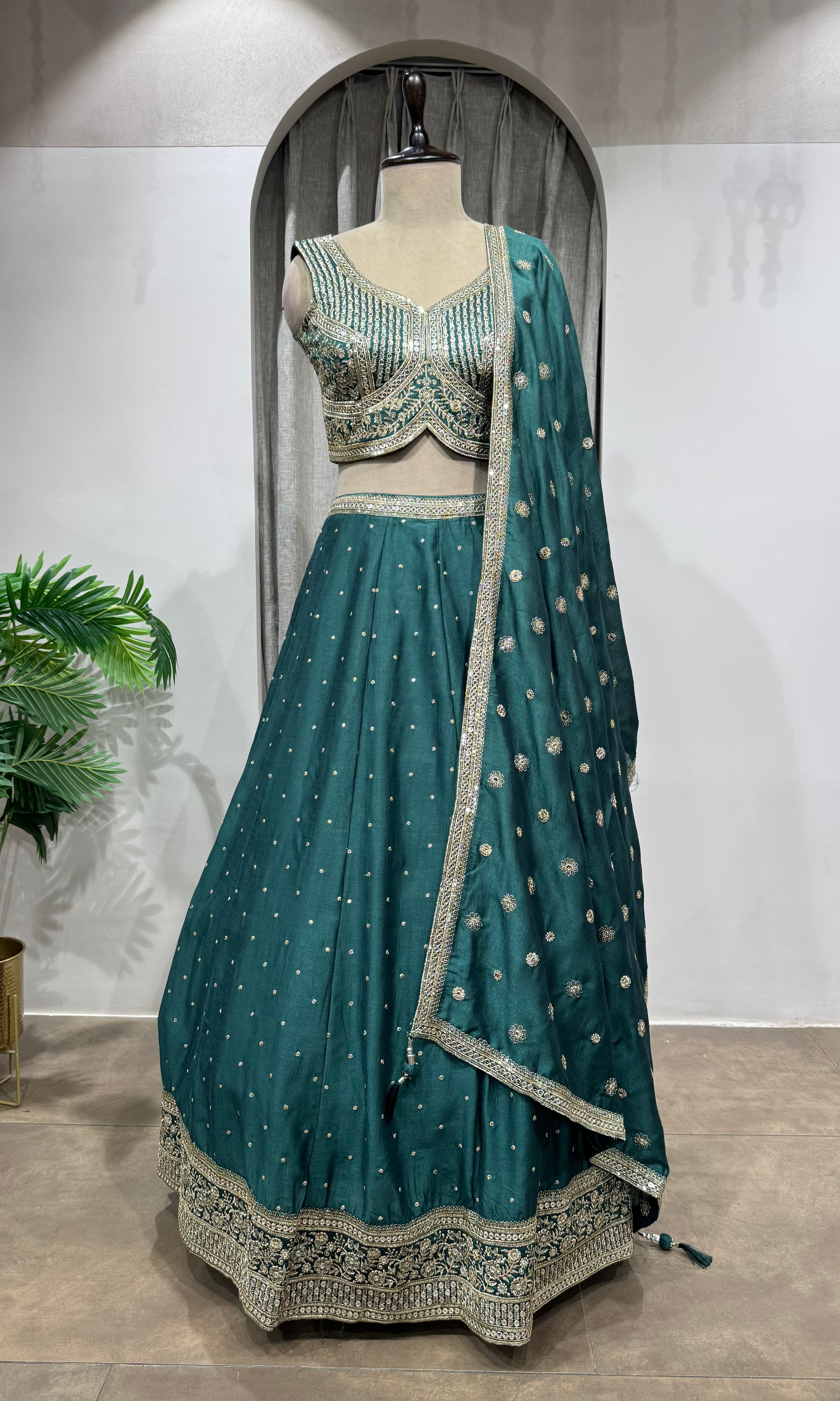 Green silver and gold embroidery lehenga set