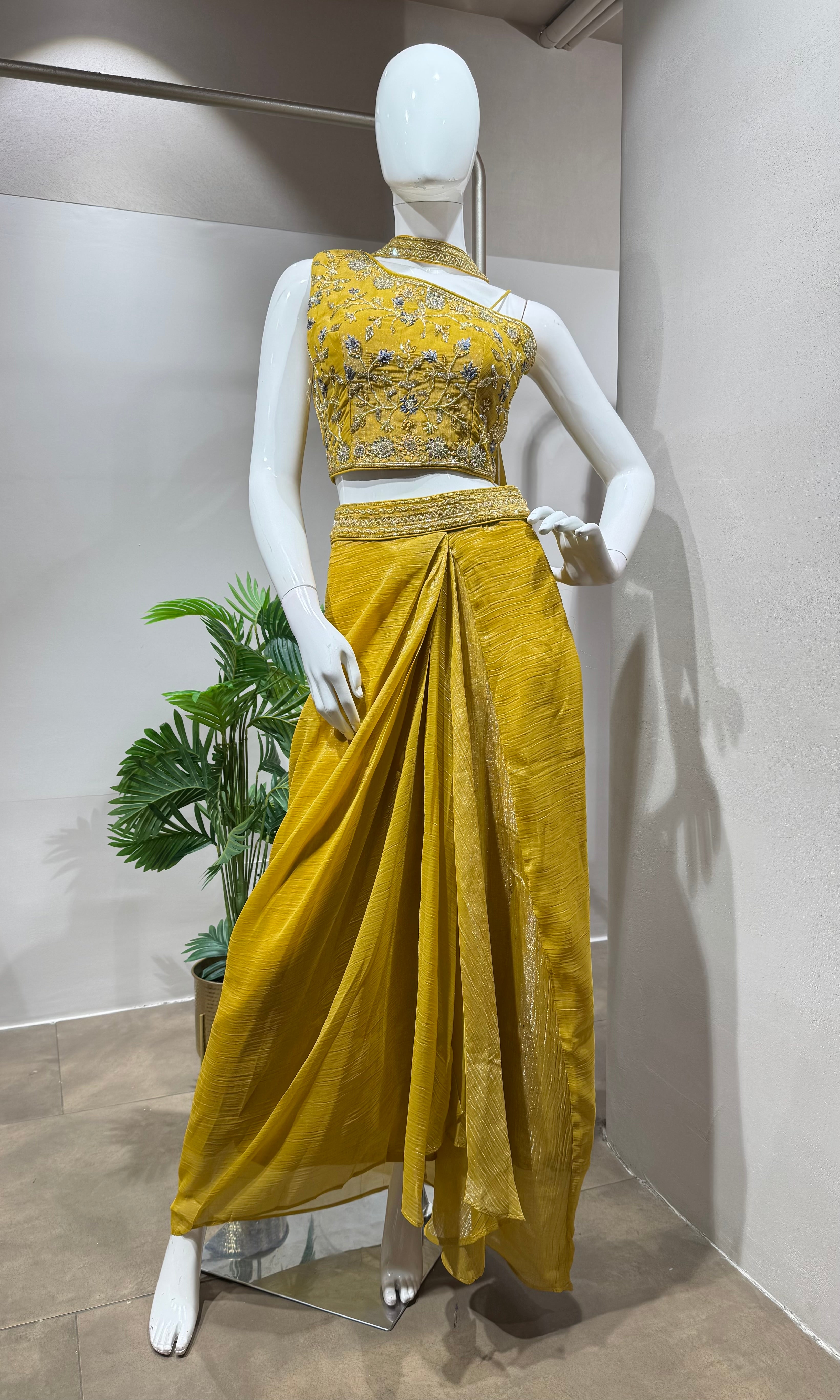 mustard draped skirt with embellished blouse