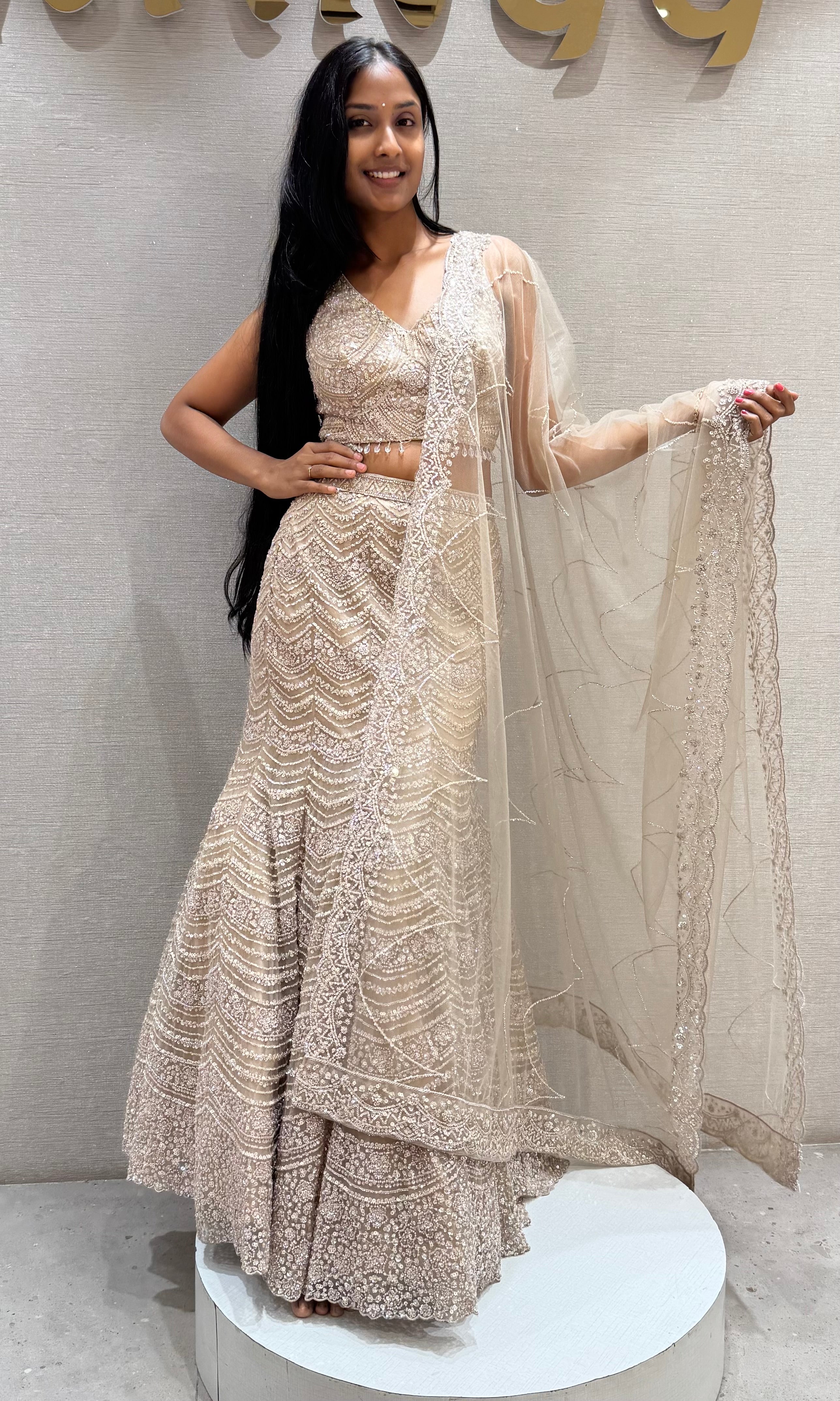 Beige sequins and beads champagne lehenga