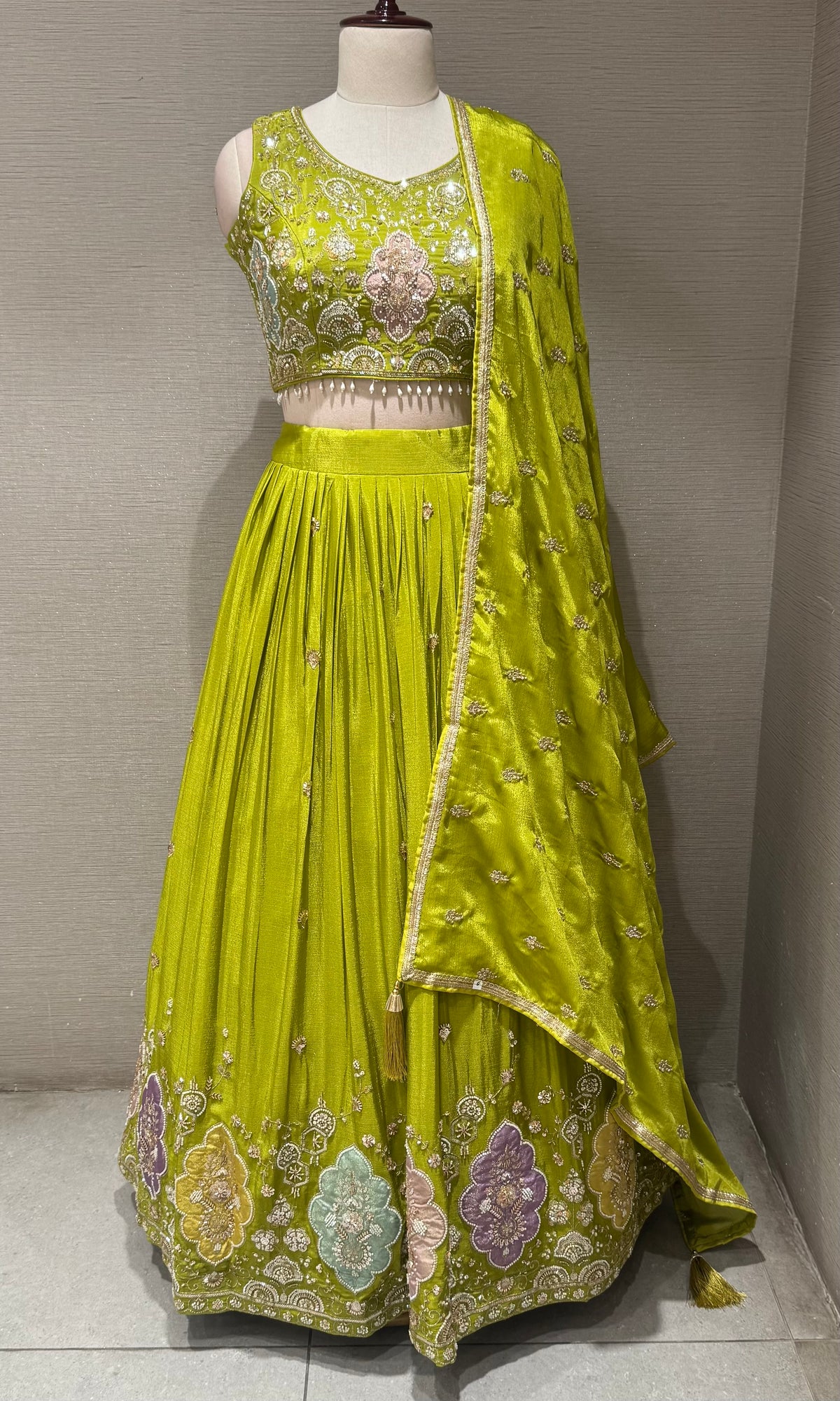 Lime Green Tissue silk Lehenga with Multi Floral border