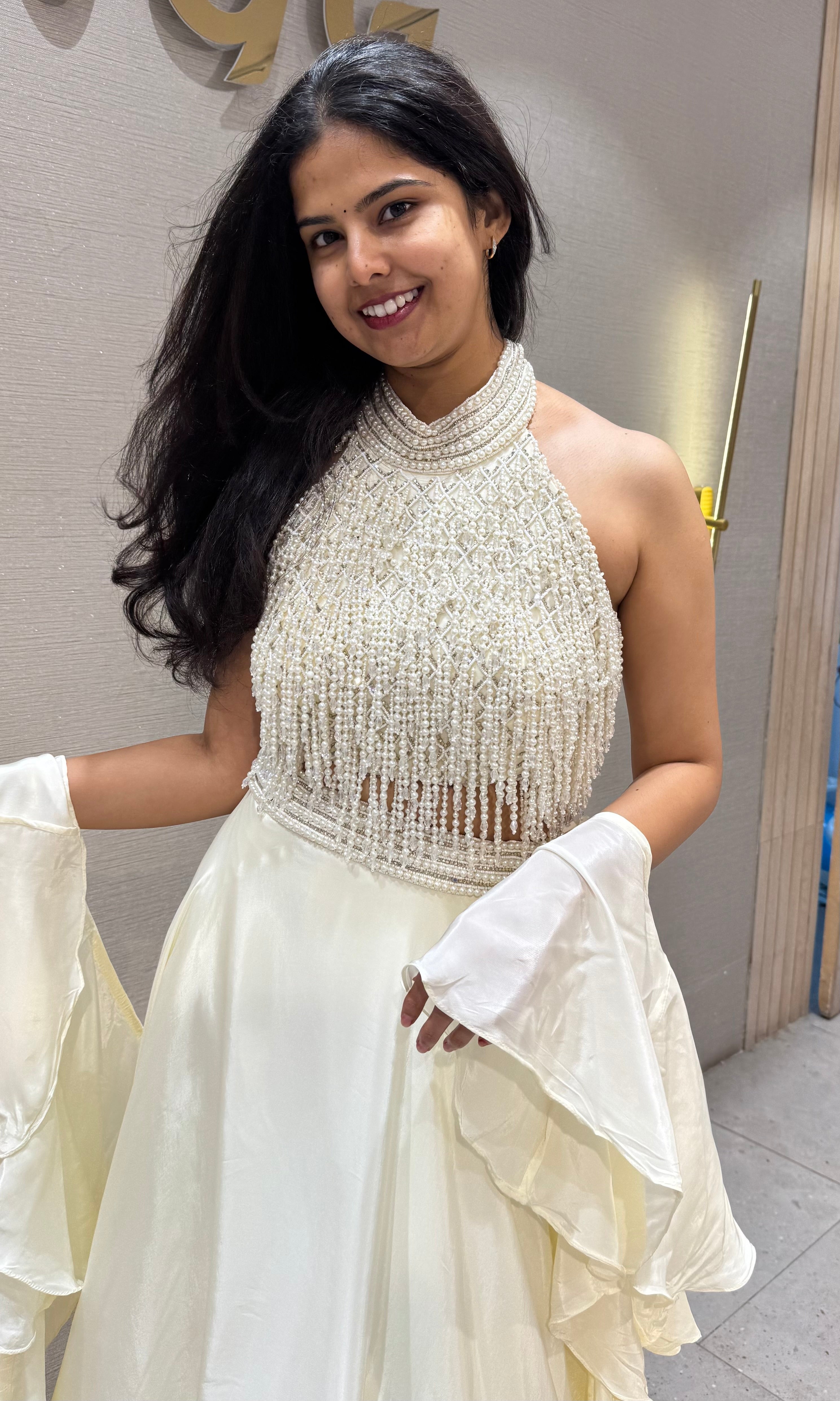 Cream Halter Lehenga with Beaded Fringe Ruffled Sleeves