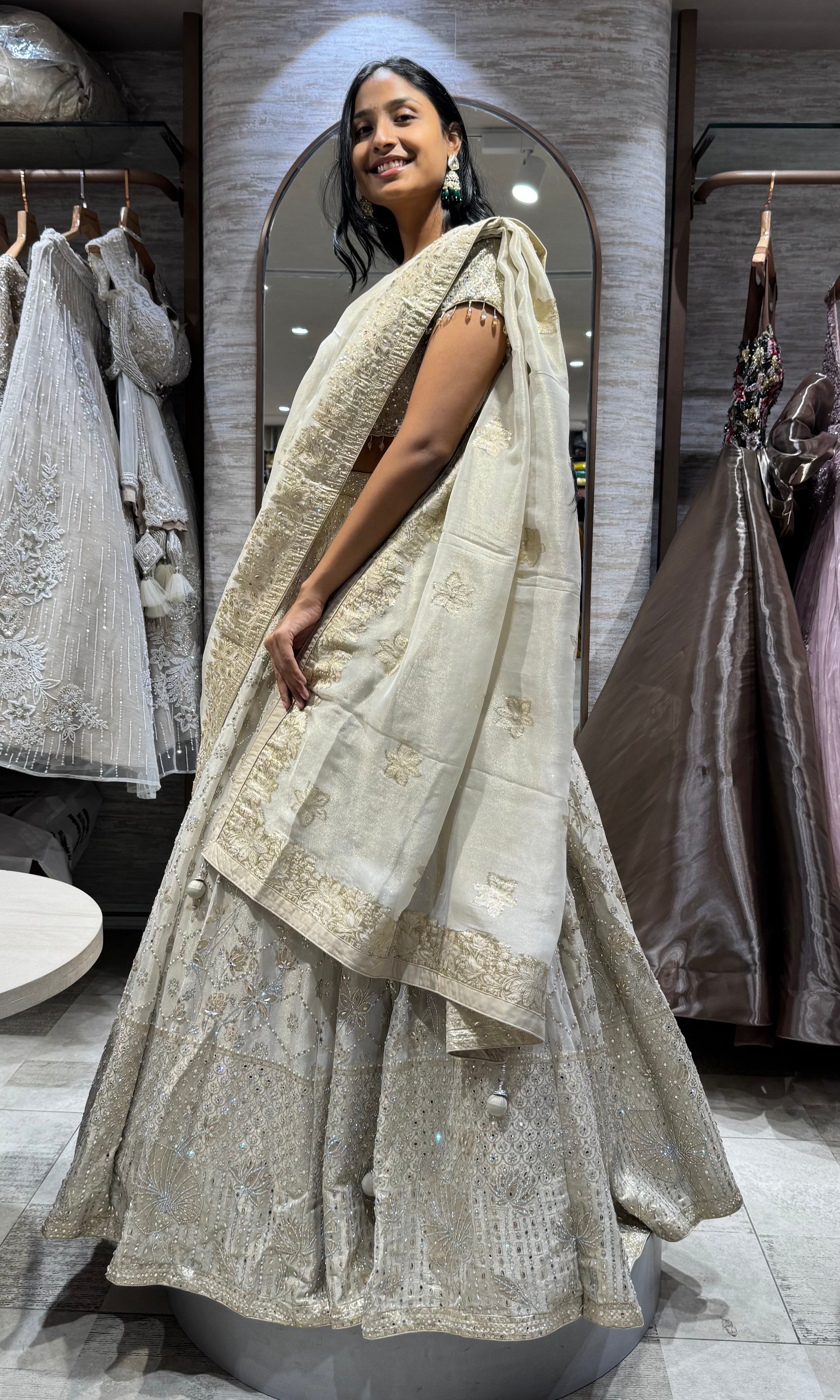 Gold intricate silver embroidery lehenga
