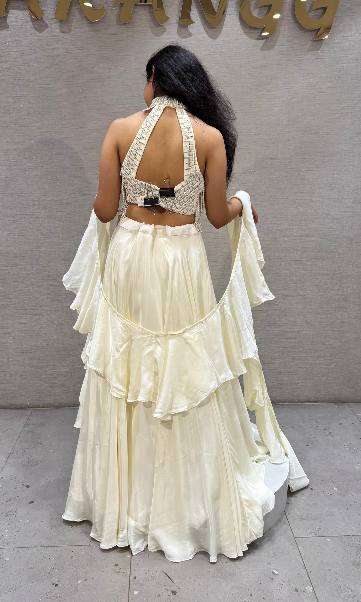Cream Halter Lehenga with Beaded Fringe Ruffled Sleeves