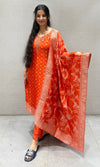 Radiant Orange Bandhani Print Kurta set with Floral Dupatta