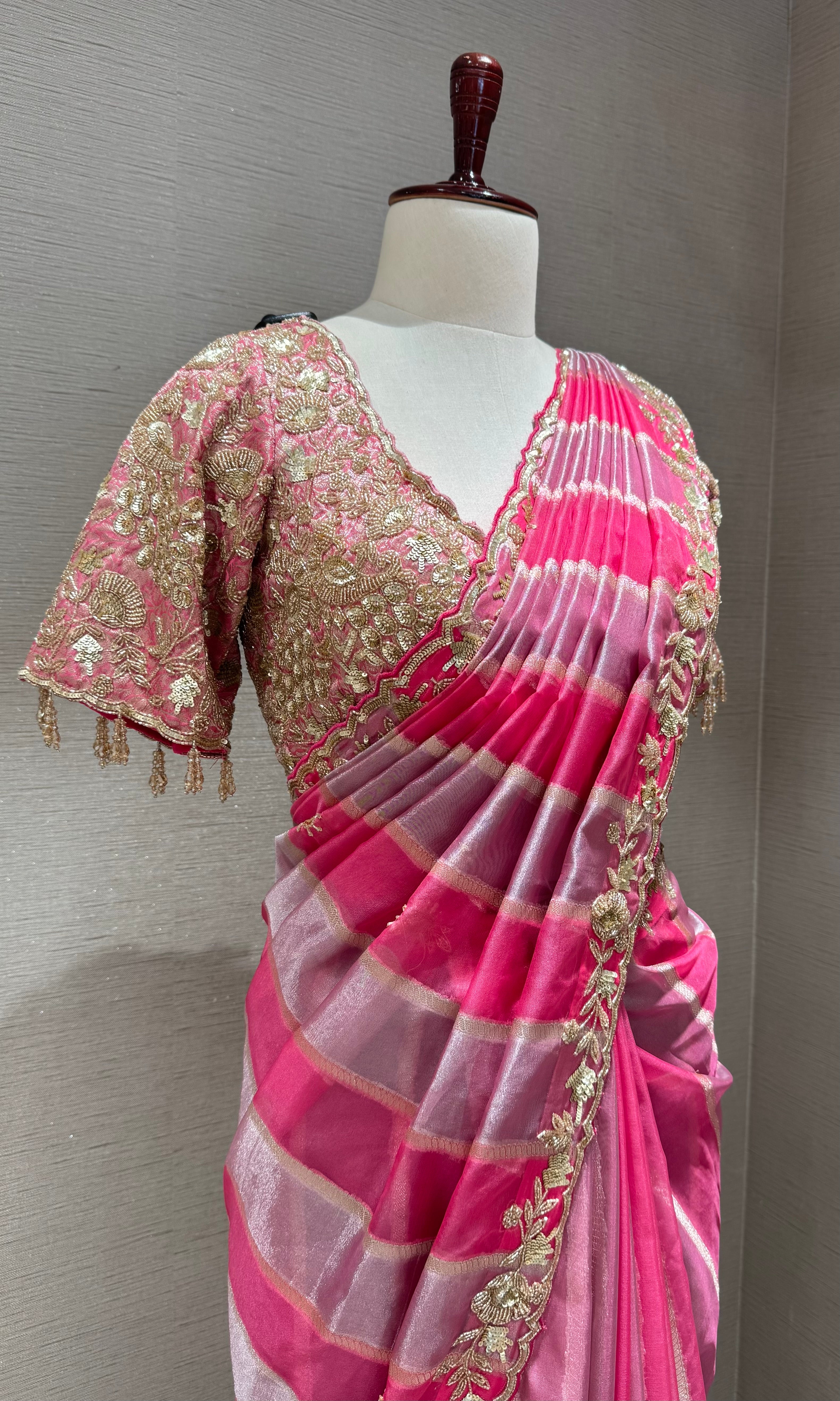 pink leheriya tissue saree with embellished blouse