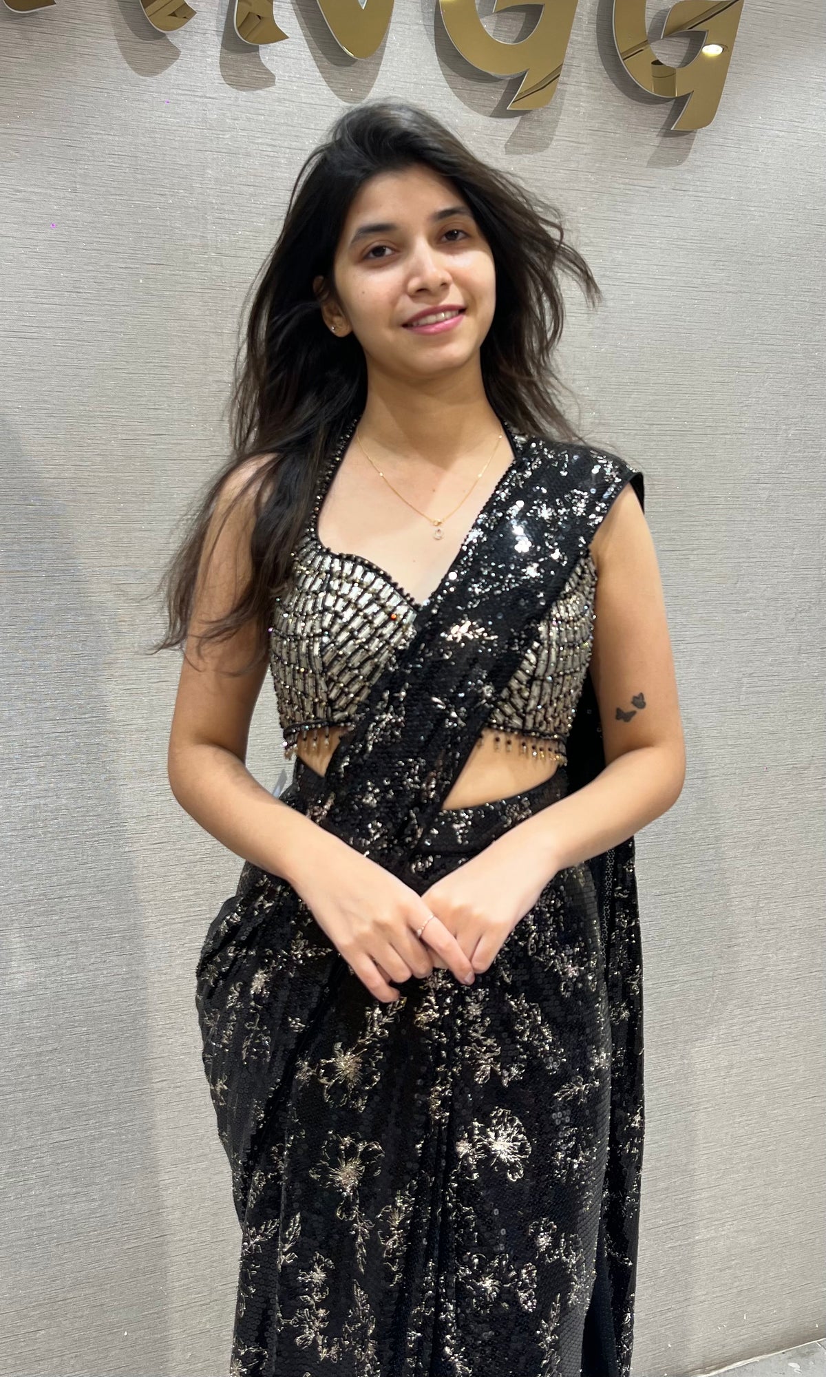 black georgette saree with sequin embellished blouse