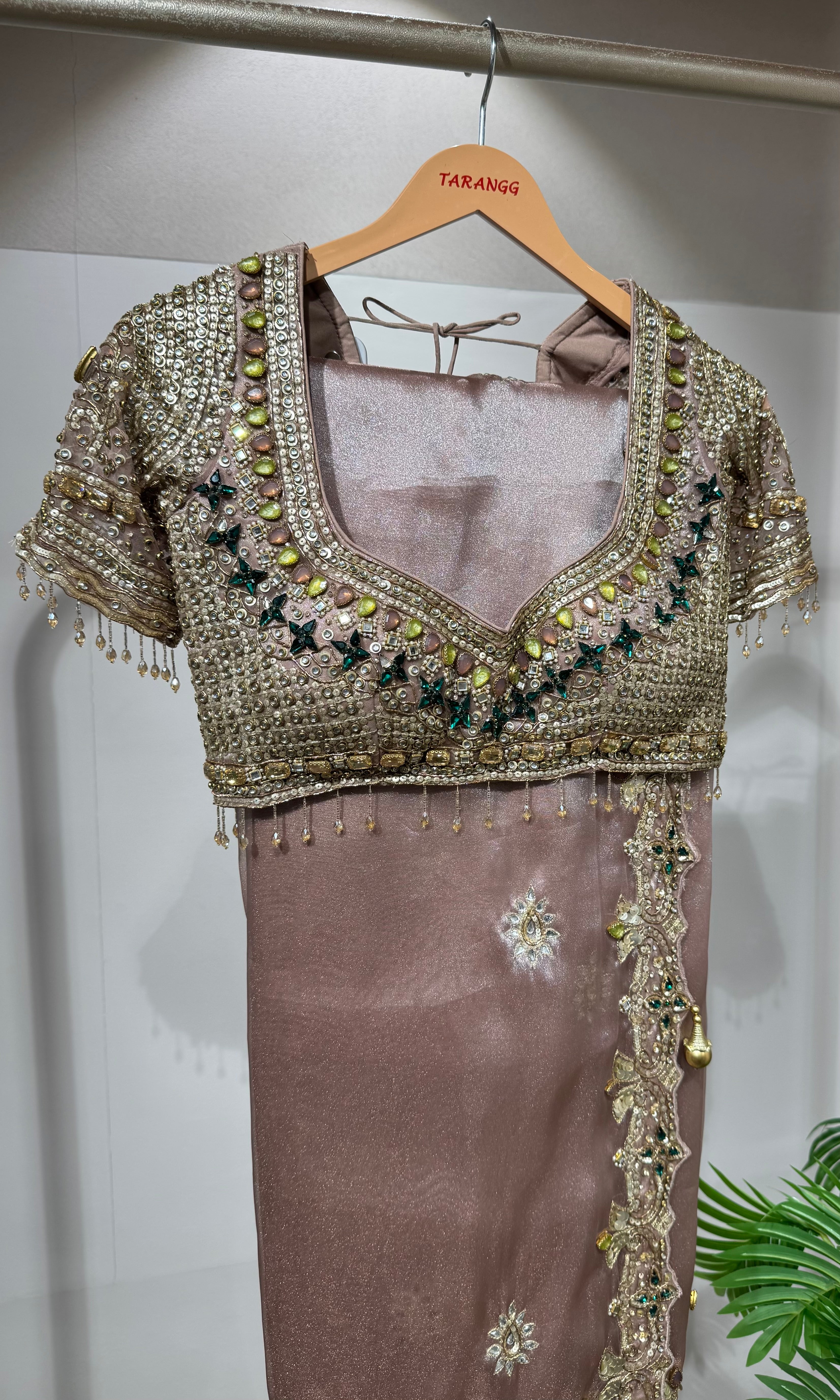 Onion pink Shimmer Saree with Multi-Stone Blouse