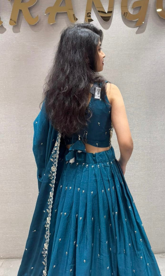 Peacock blue Lehenga with gold embroidery