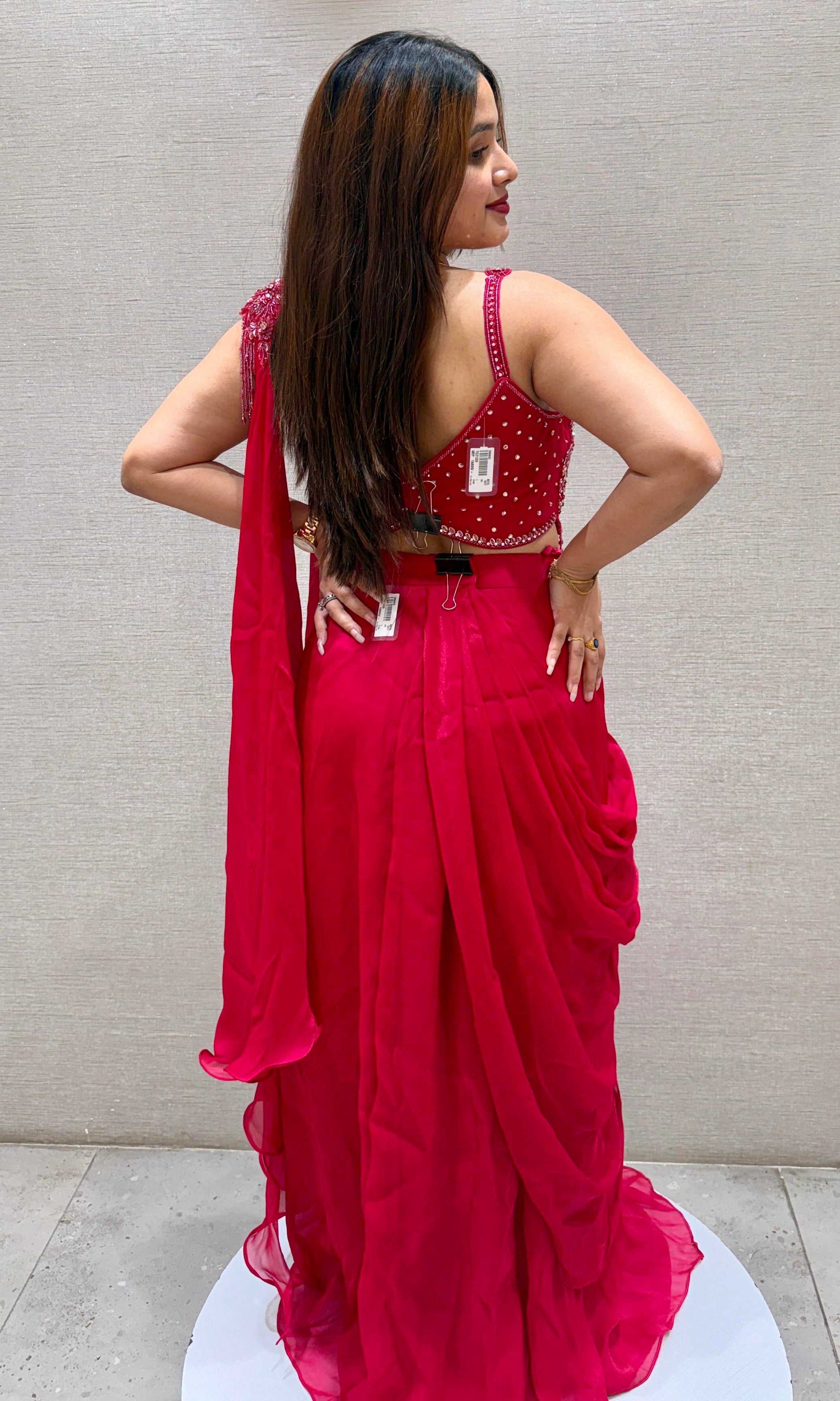 Red drape saree with embellished blouse