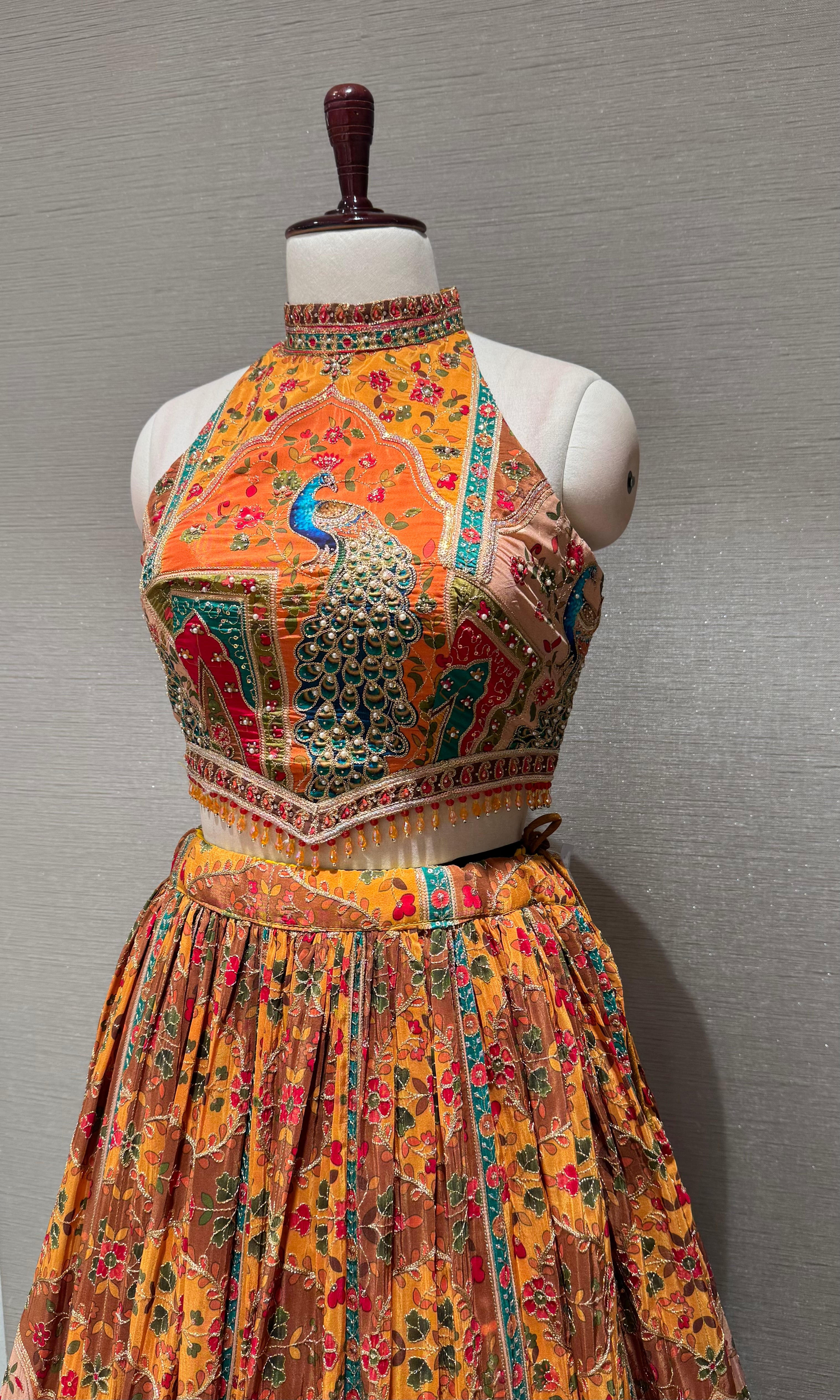 Mustard Mayur Pichwai halter neck Lehenga set
