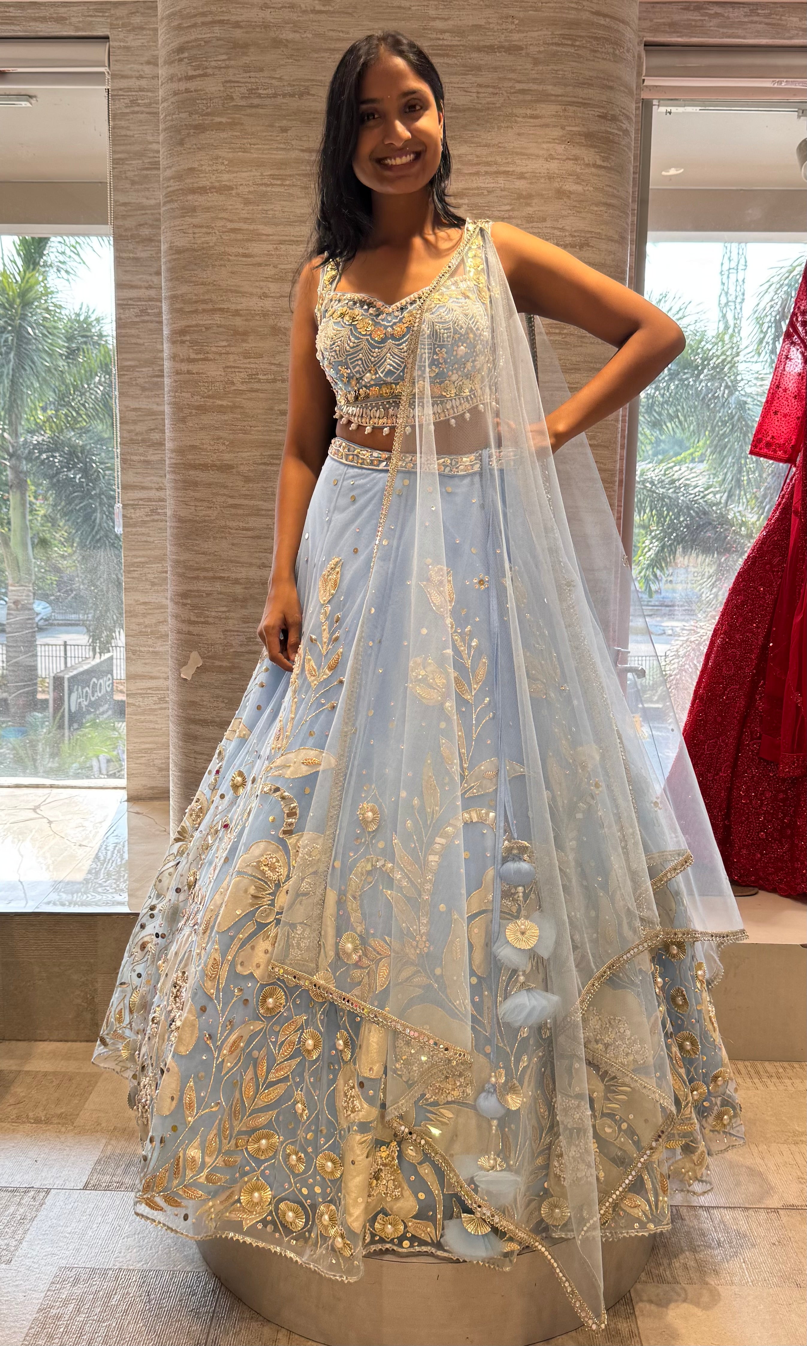 Light blue heavy gold embroidery lehenga