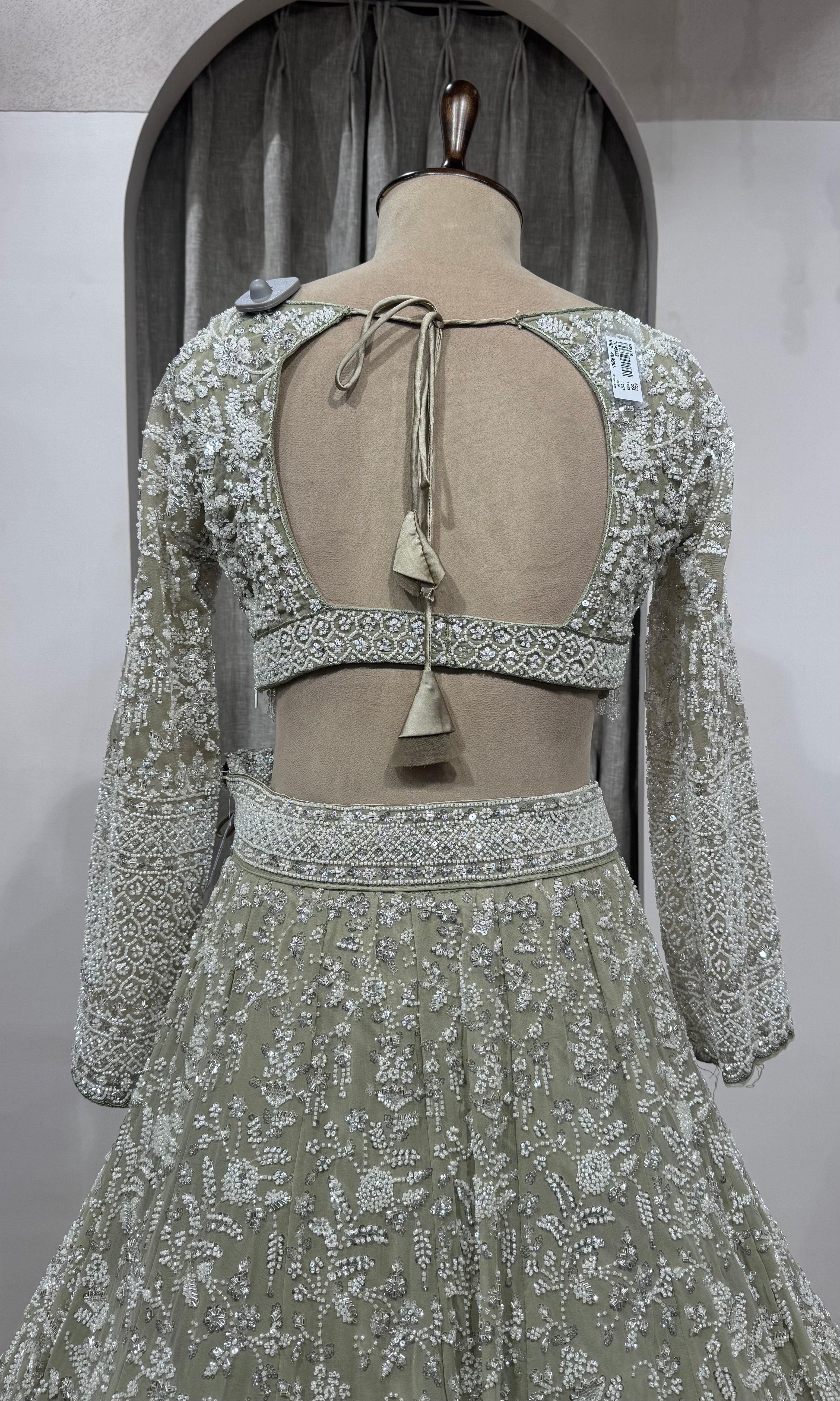 Sage Green Heavily Embroidered Net Bridal Lehenga