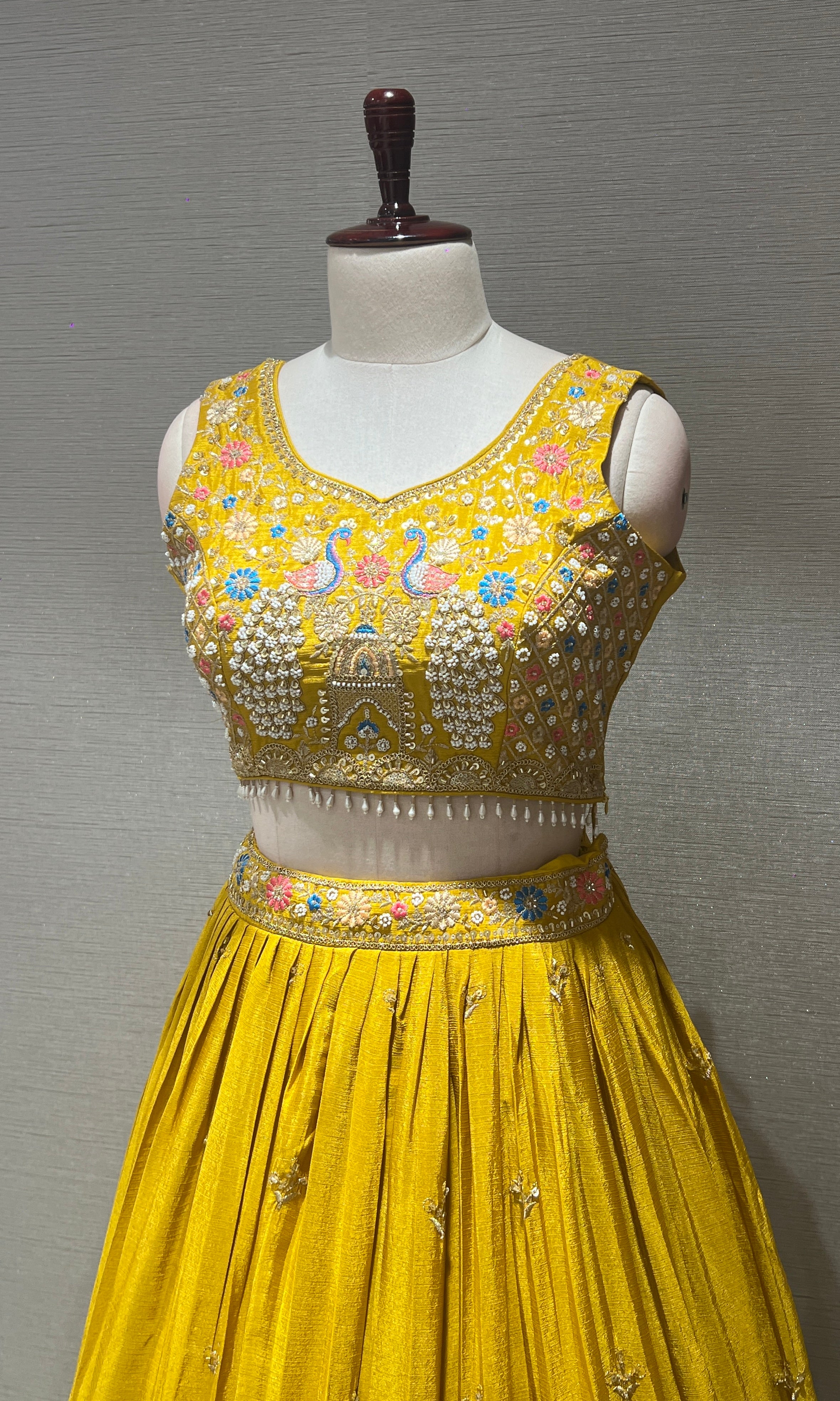 Yellow peacock embroidered Lehenga