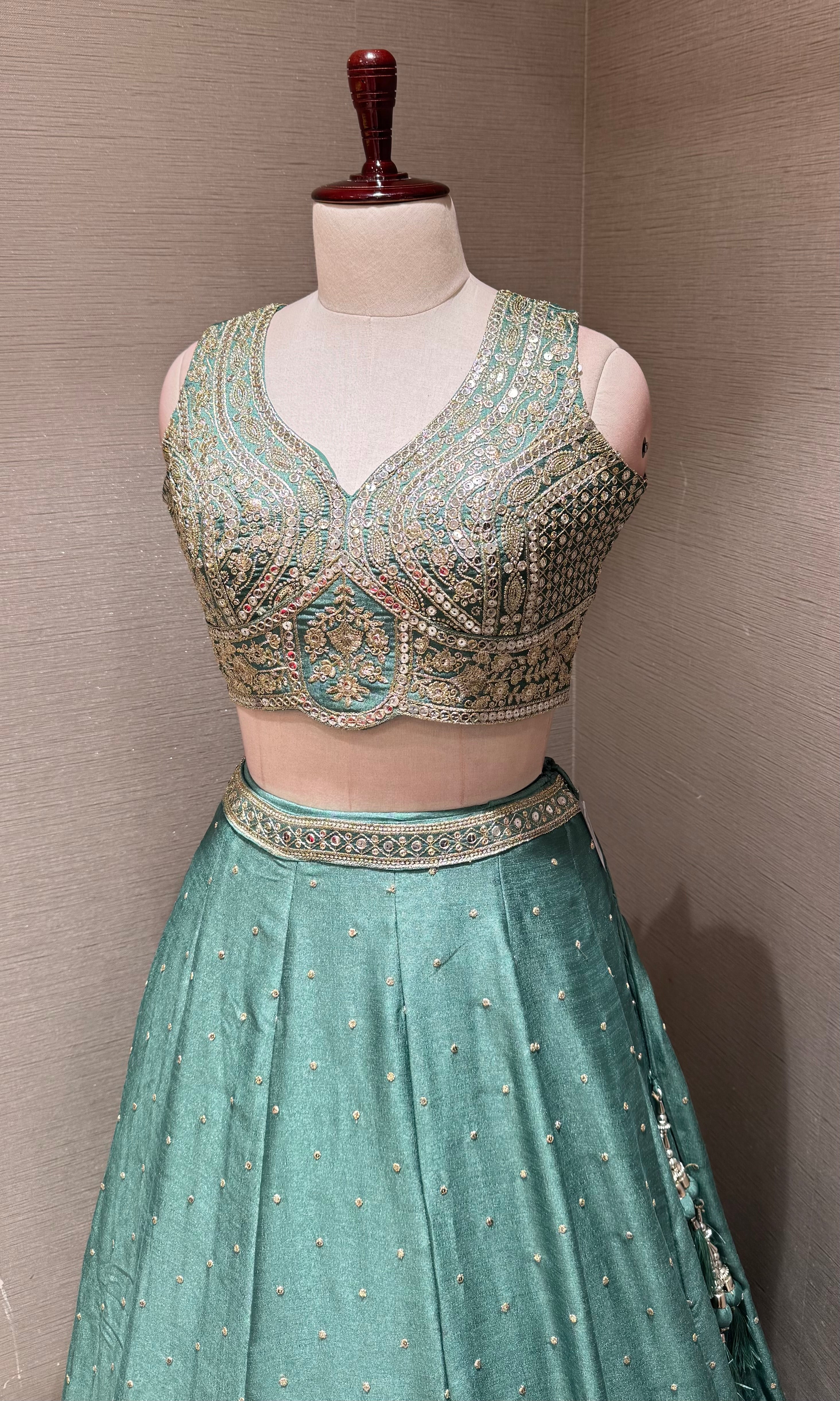 Green Flared Lehenga Choli with Heavy Gold Embroidery