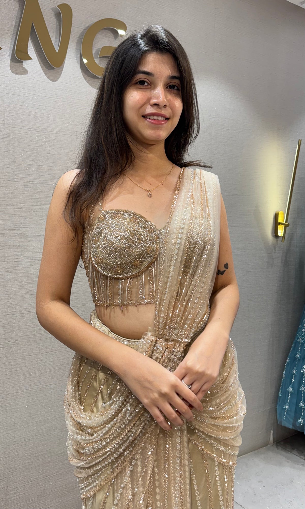 Gold Shimmer Cocktail Draped Saree with Sweetheart Corset Blouse