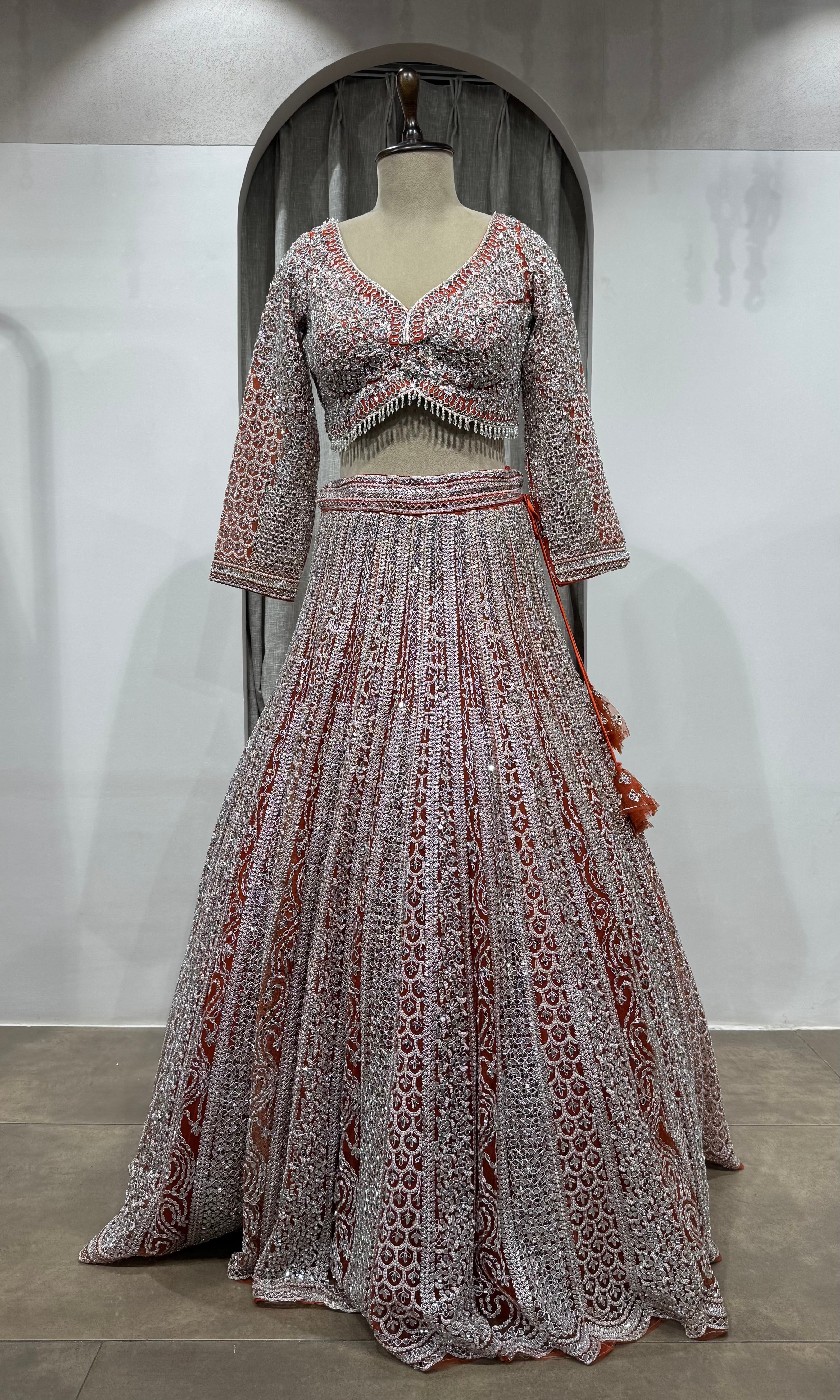 Rust and grey heavy bridal lehenga