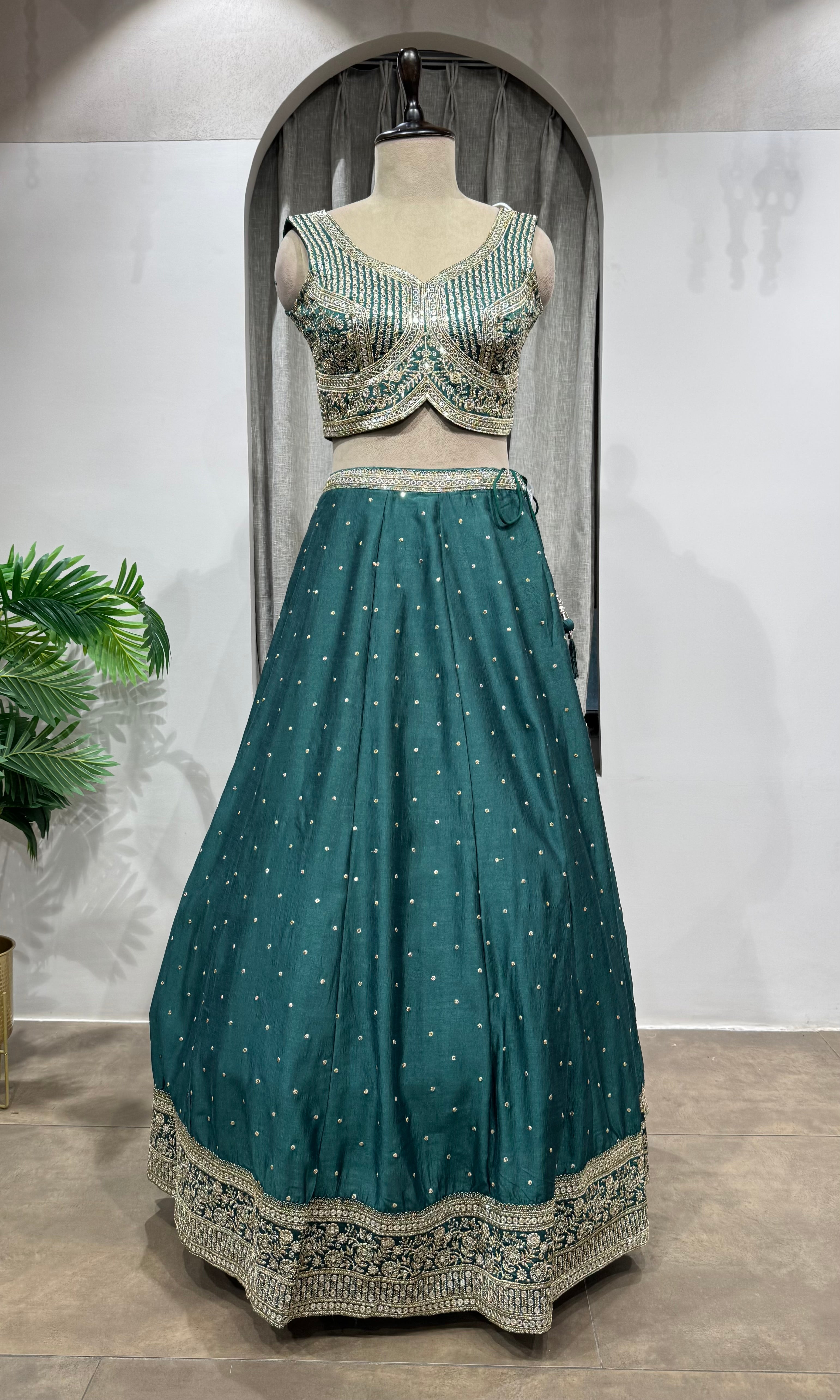 Green silver and gold embroidery lehenga set