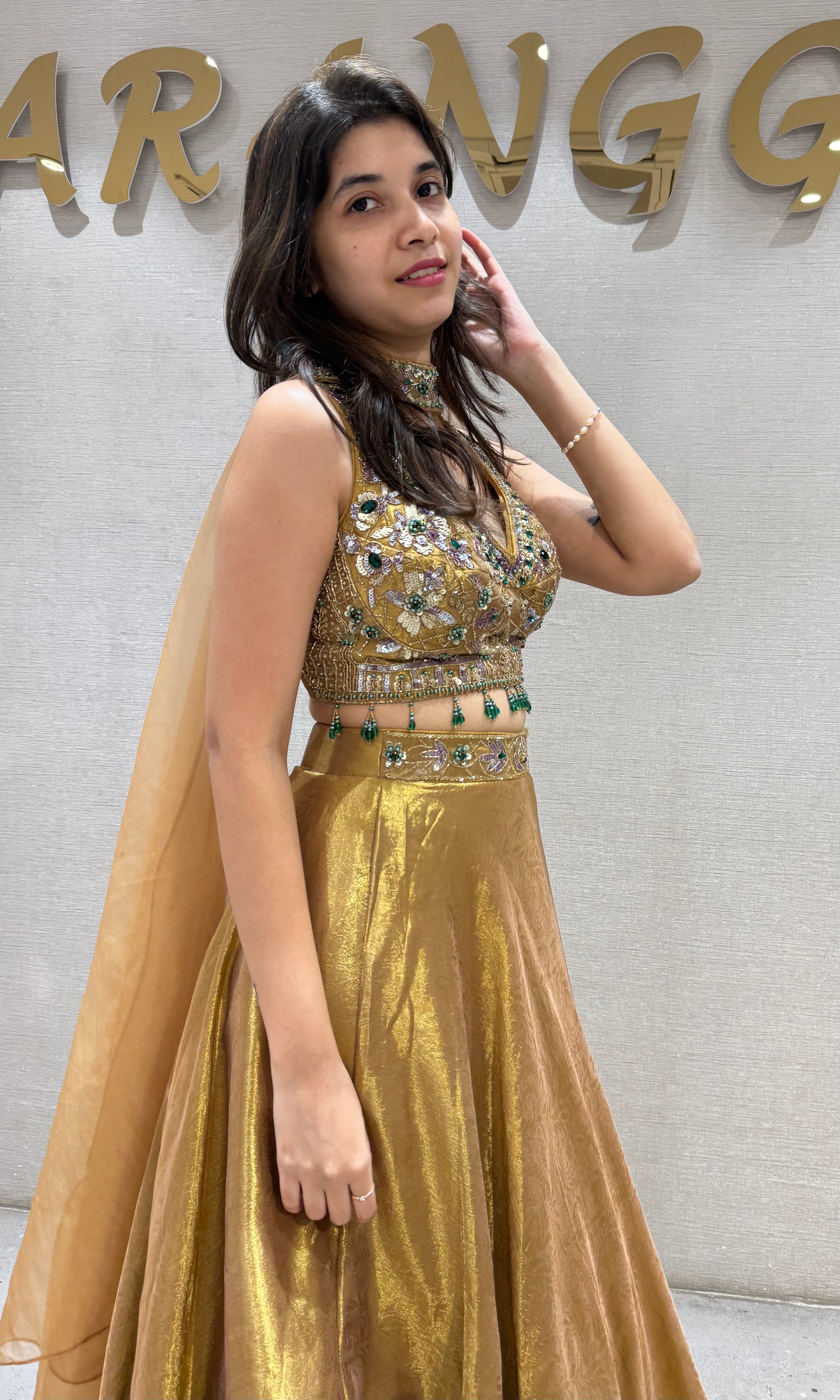 Gold tissue intricate embroidered lehenga