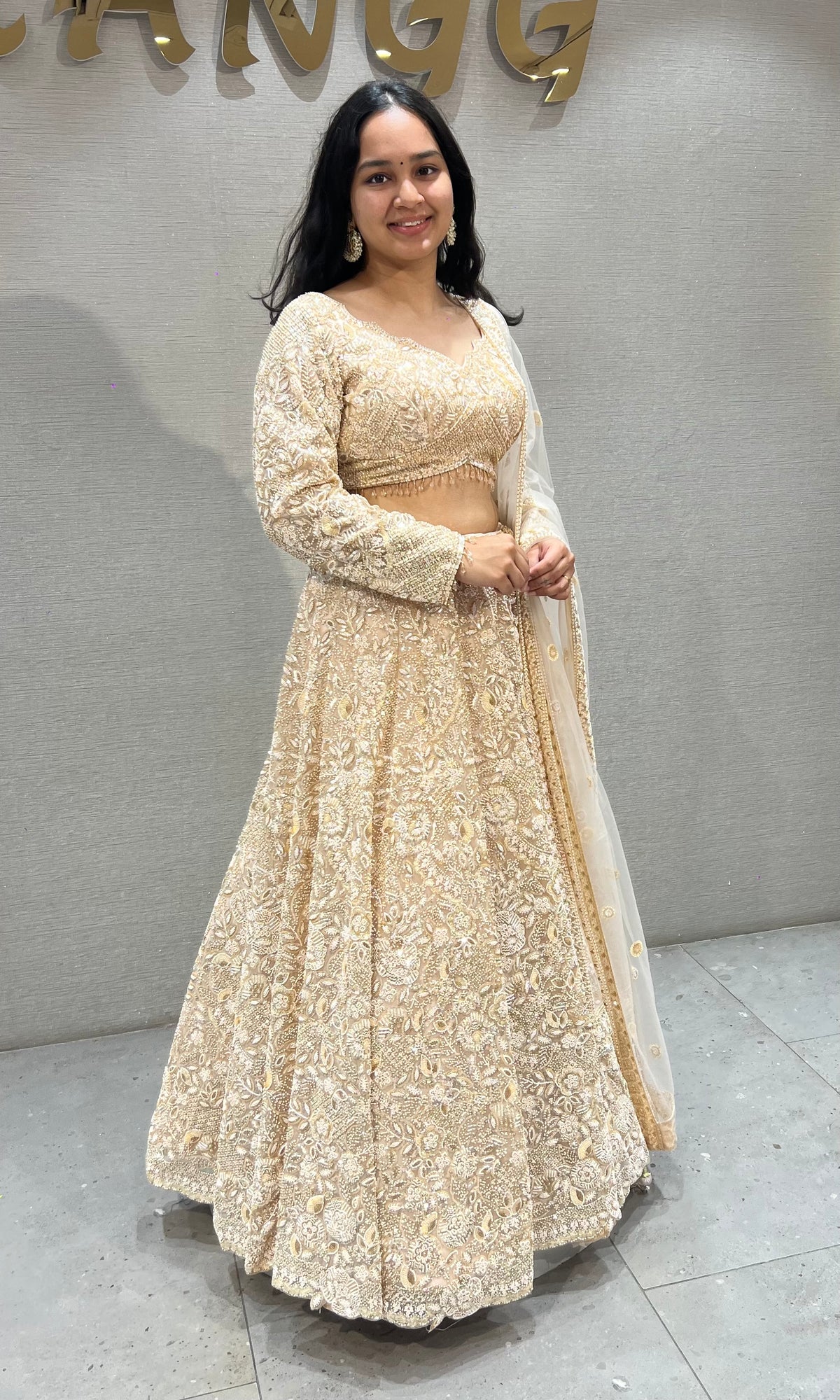 Champagne Cream Embellished Lehenga set with Sheer Dupatta