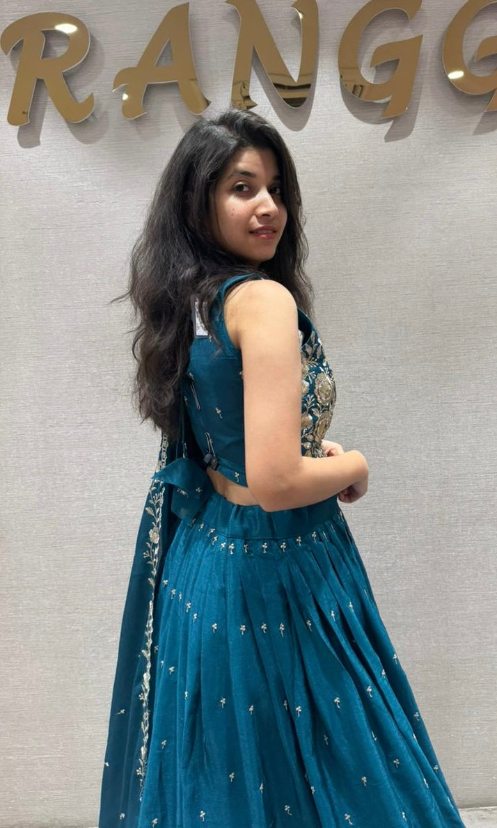 Peacock blue Lehenga with gold embroidery