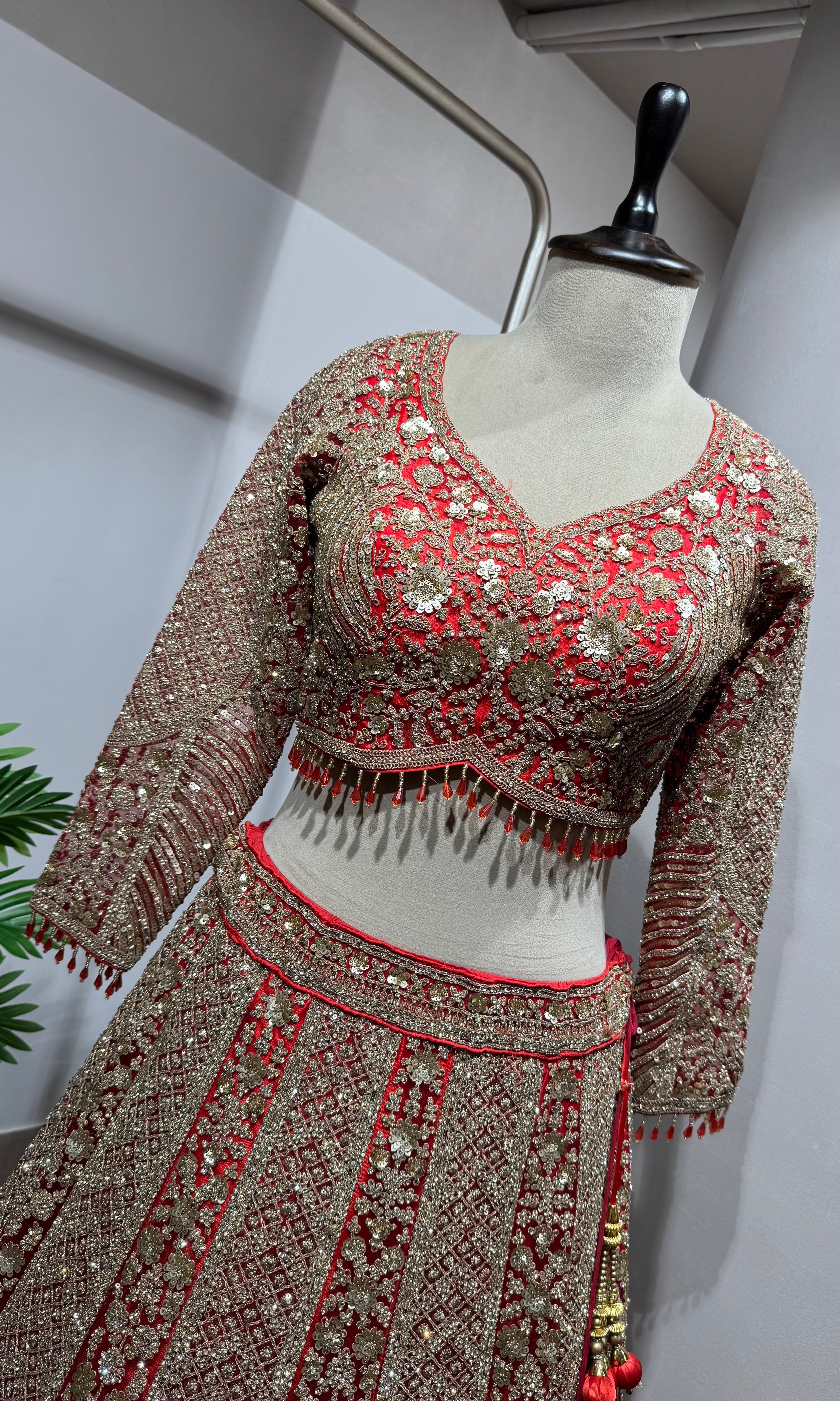 Red golden embroidery bridal lehenga