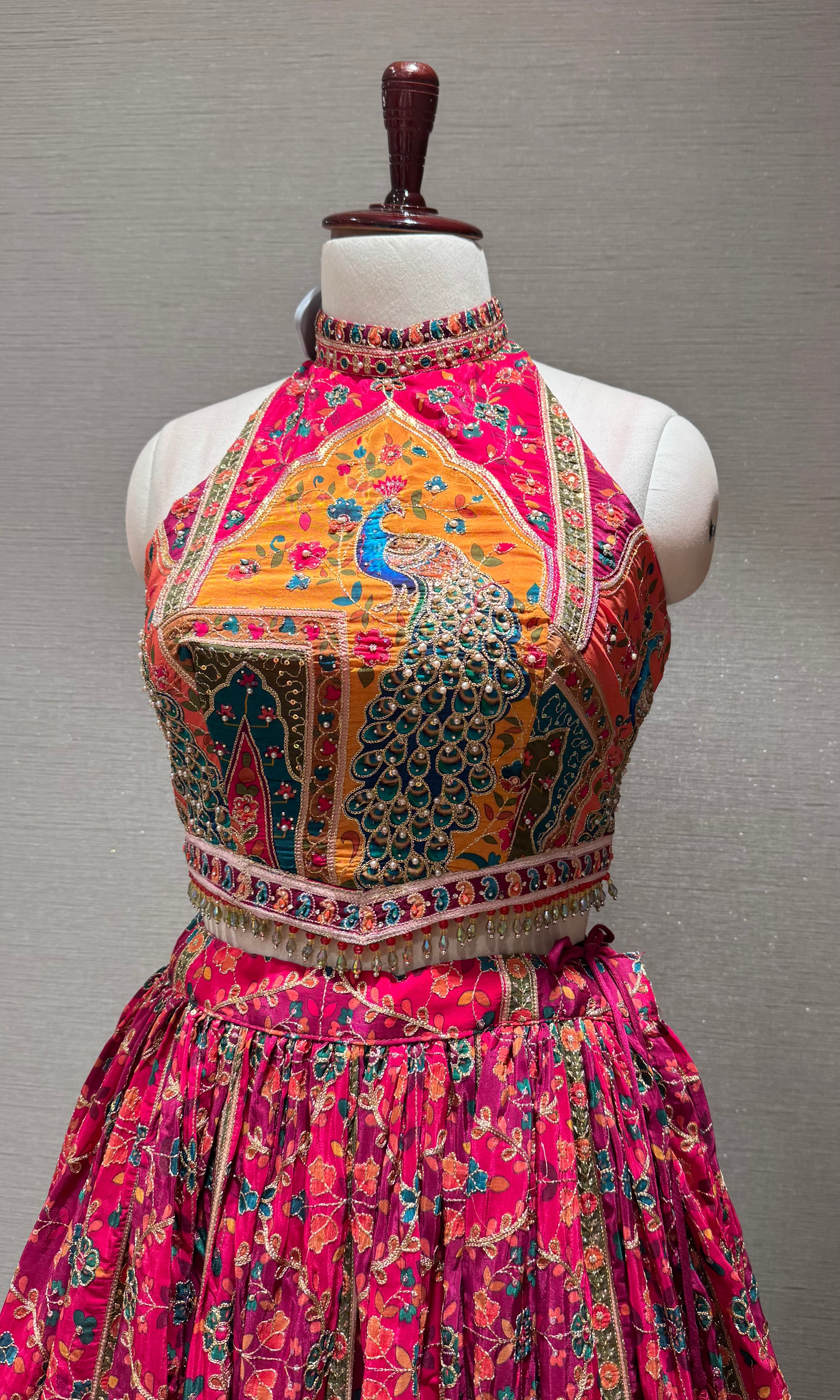 pink Mayur Pichwai halter neck Lehenga set