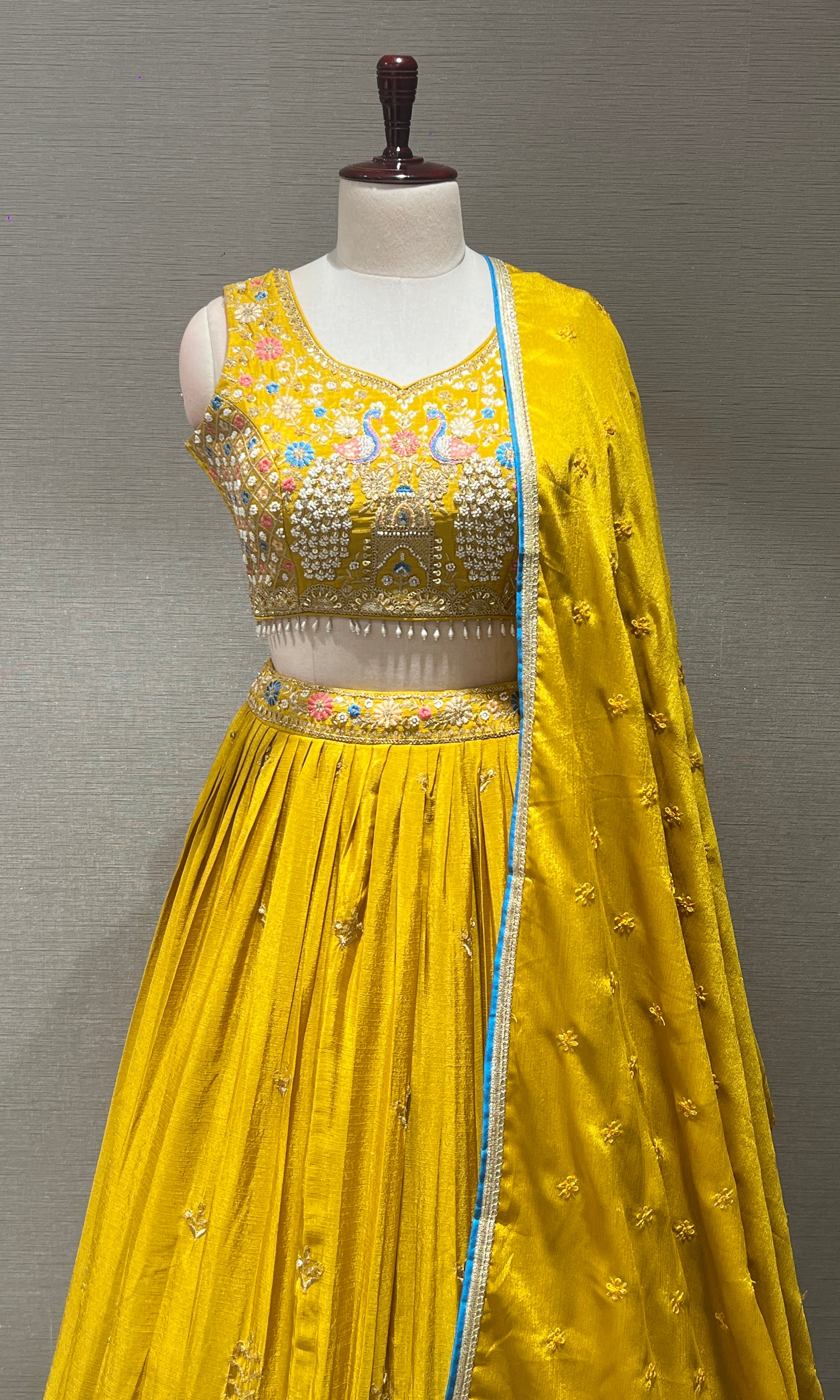 Yellow peacock embroidered Lehenga