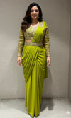 green draped saree with embellished blouse