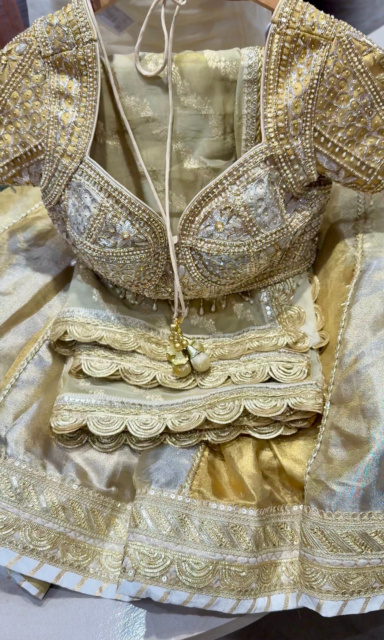 Gold and silver tissue zari lehenga