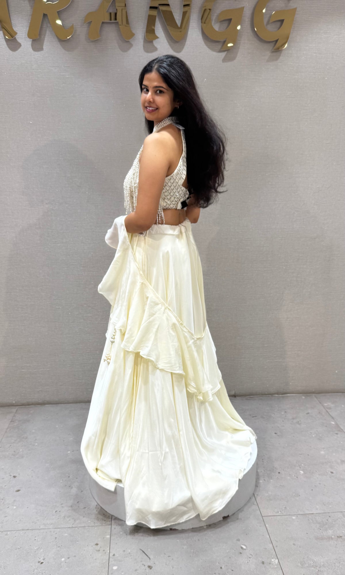 Cream Halter Lehenga with Beaded Fringe Ruffled Sleeves