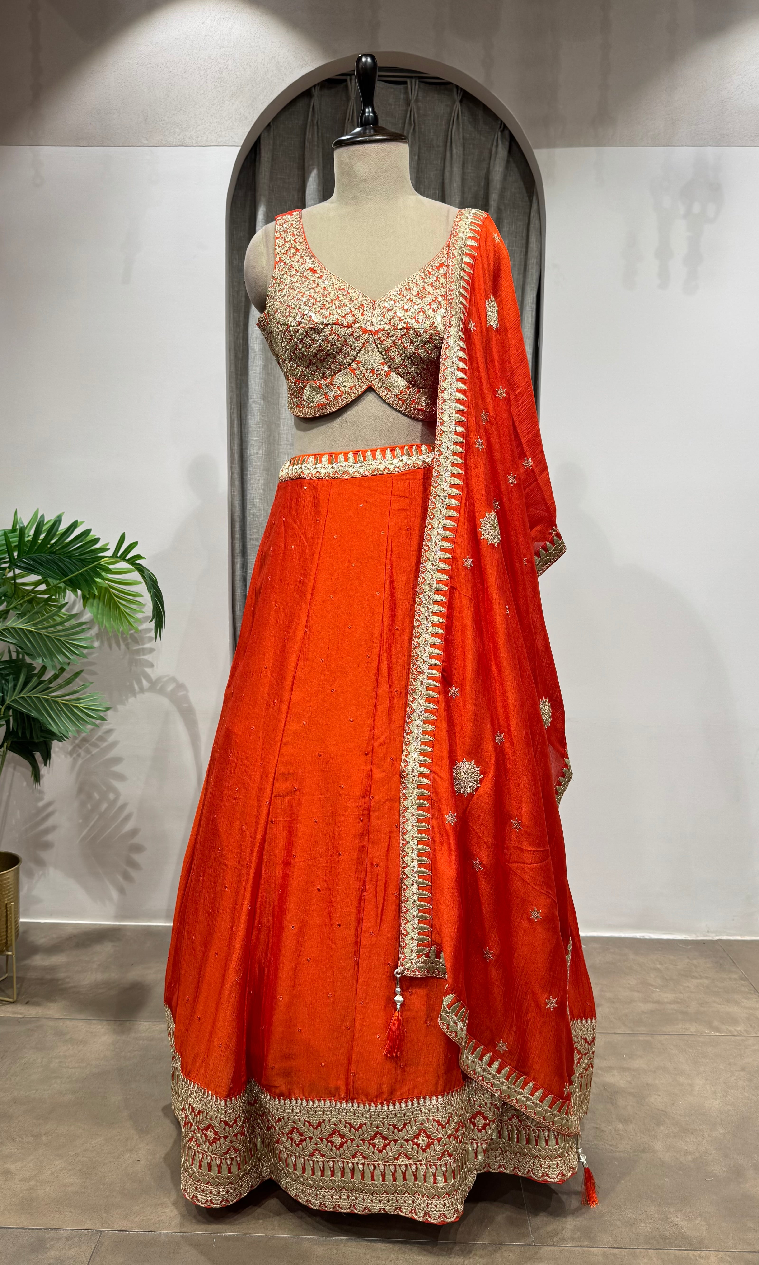 ORANGE LEHENGA WITH GOLDEN EMBROIDERY