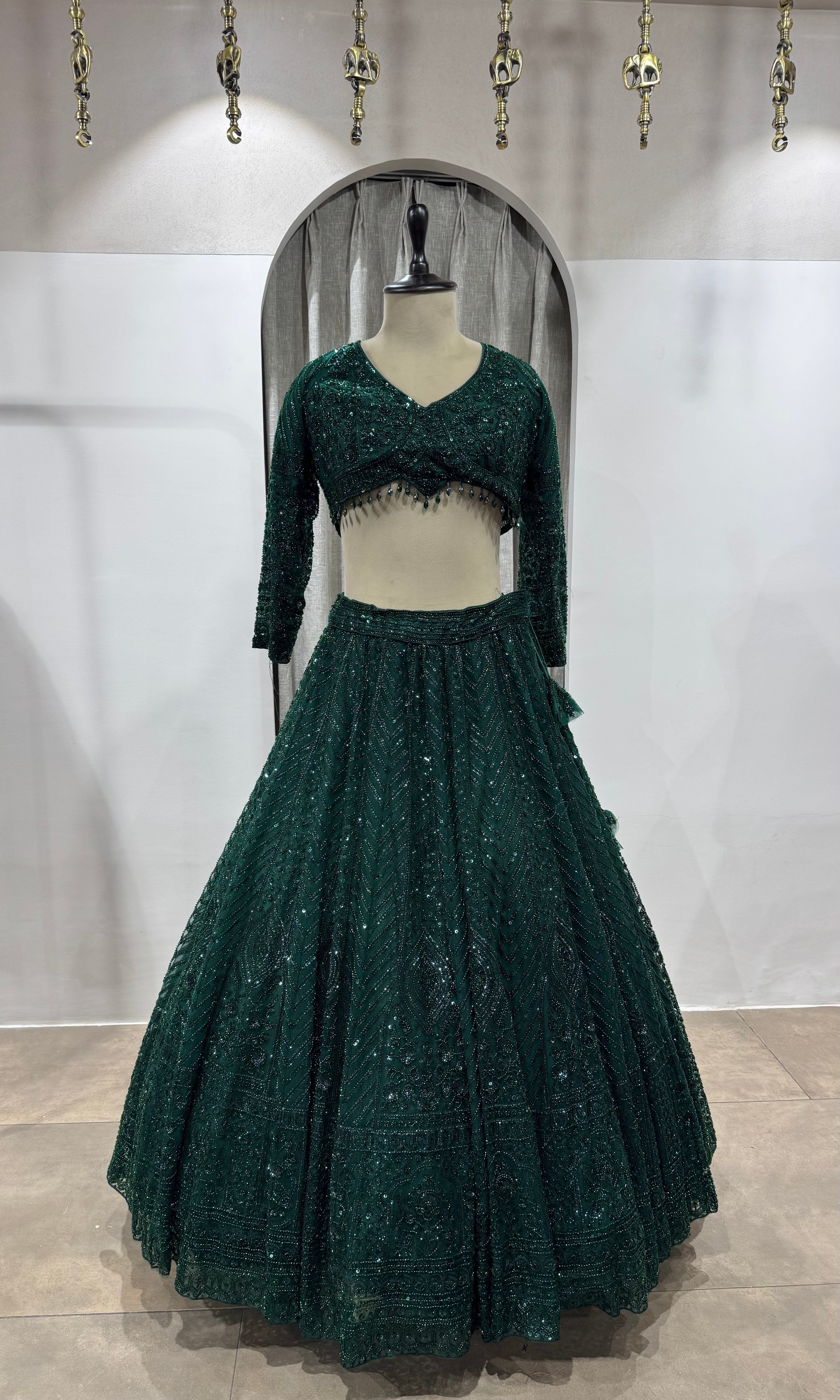 emerald green net lehenga choli