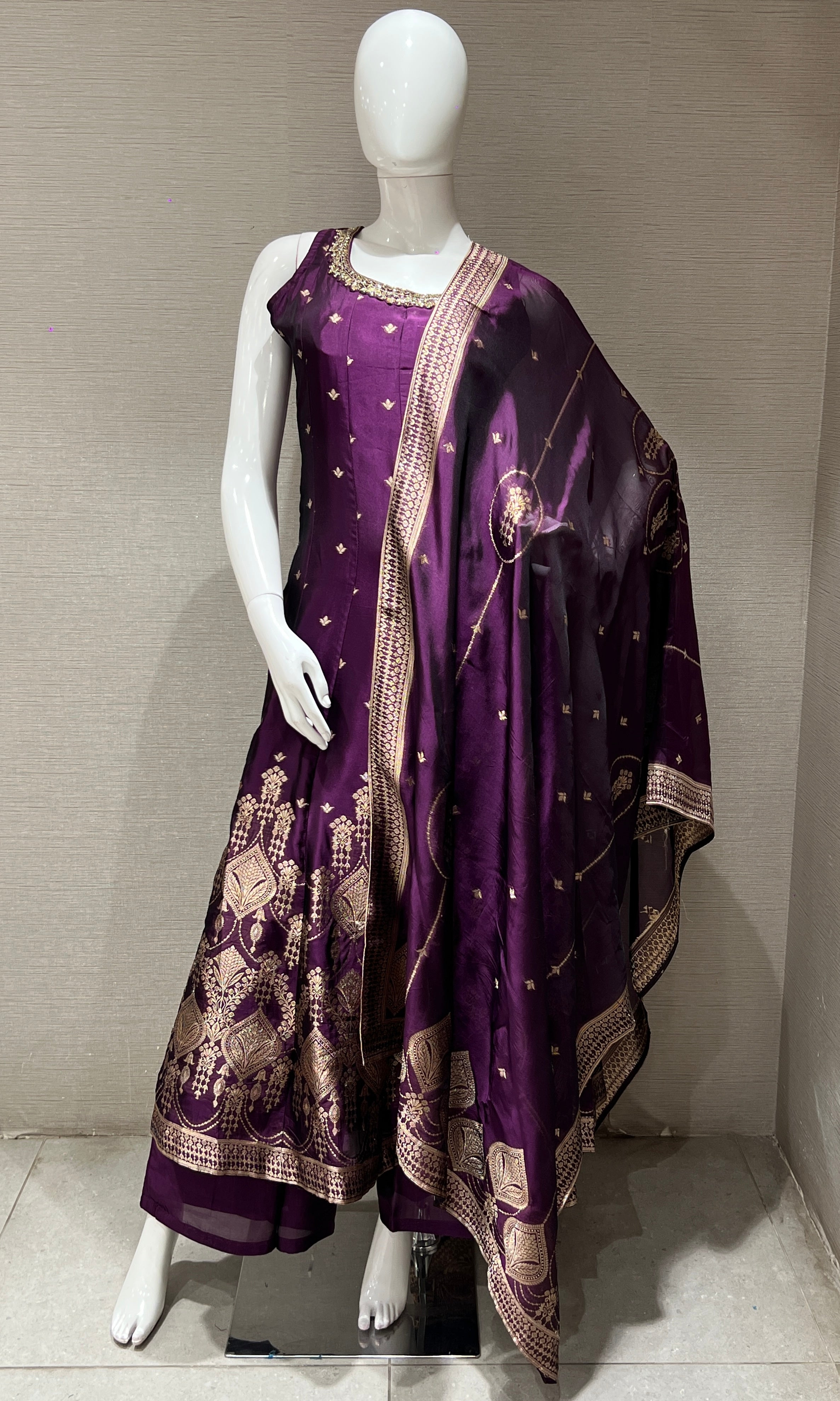 purple Anarkali with gold embroidery