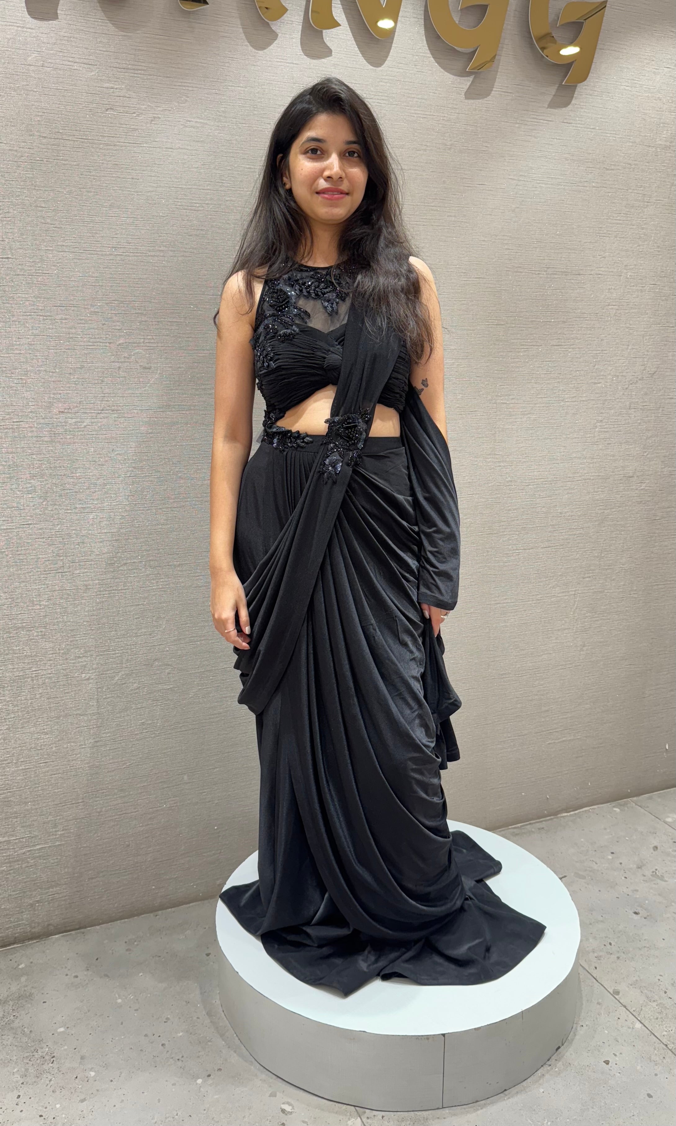 Black drape saree with halter neck blouse