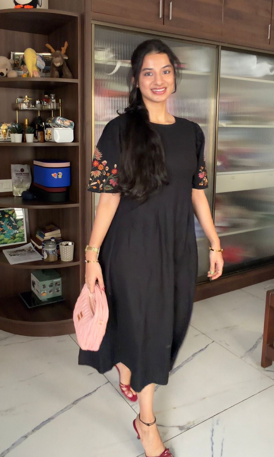 Black dress with embroidered puff sleeves