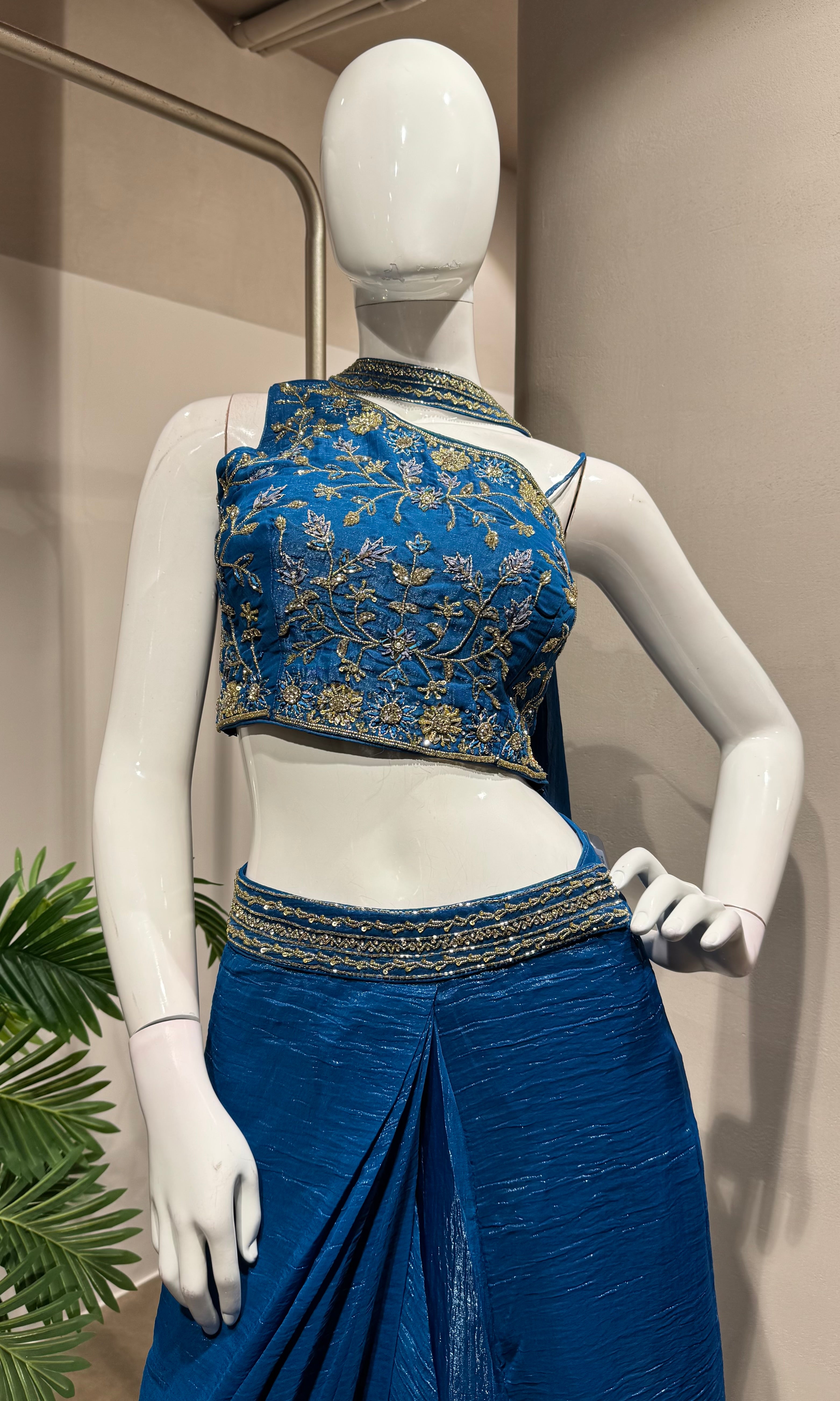 blue draped skirt with embellished blouse