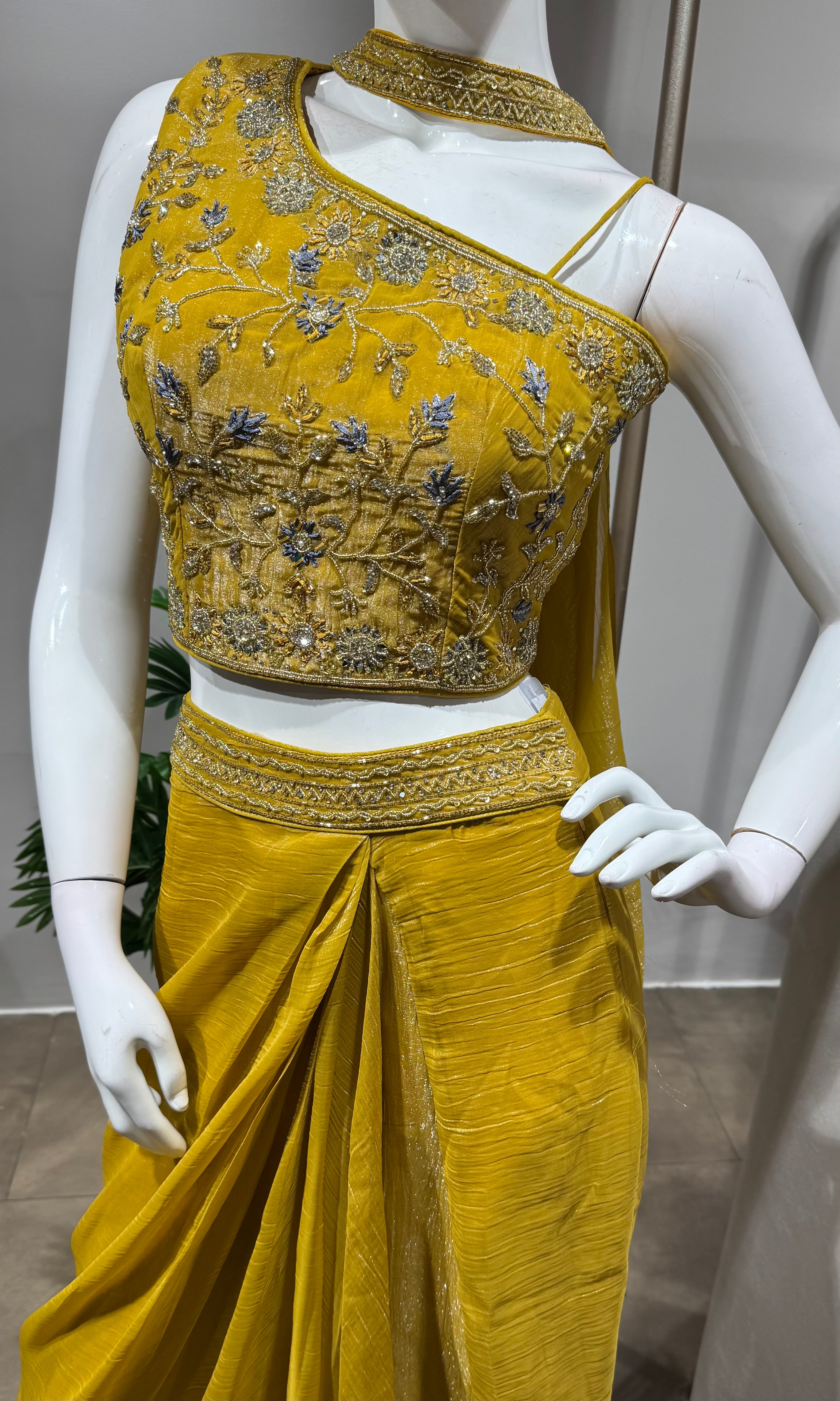 mustard draped skirt with embellished blouse