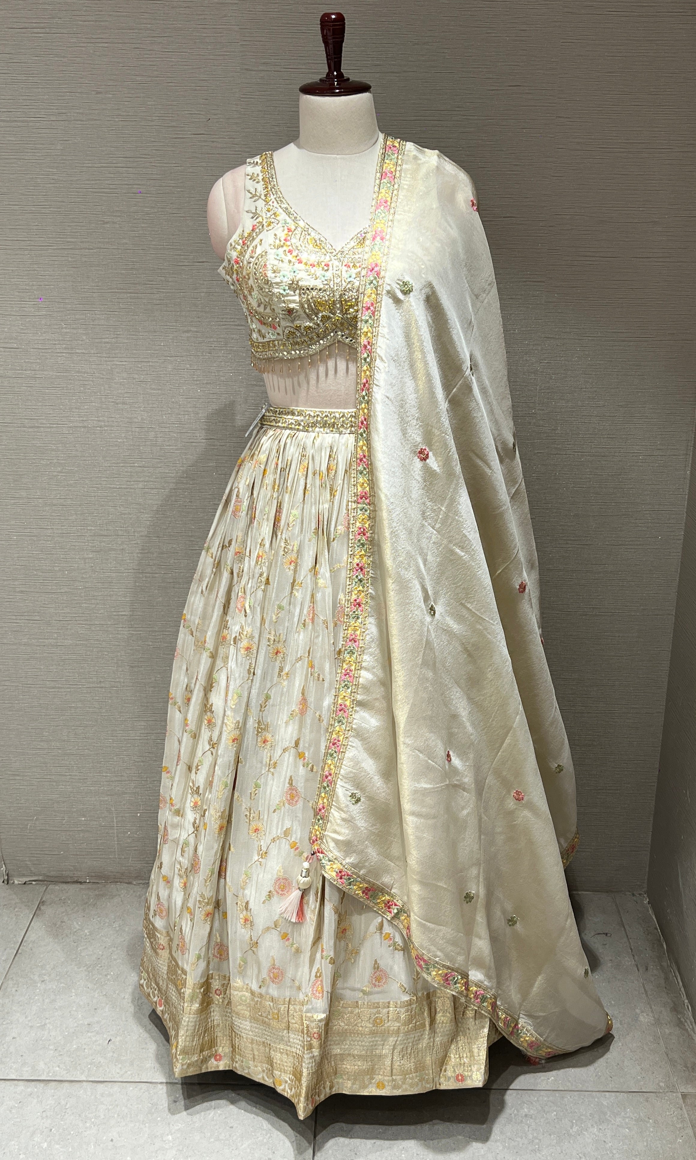 Half white Floral embroidred Lehenga with Golden Border