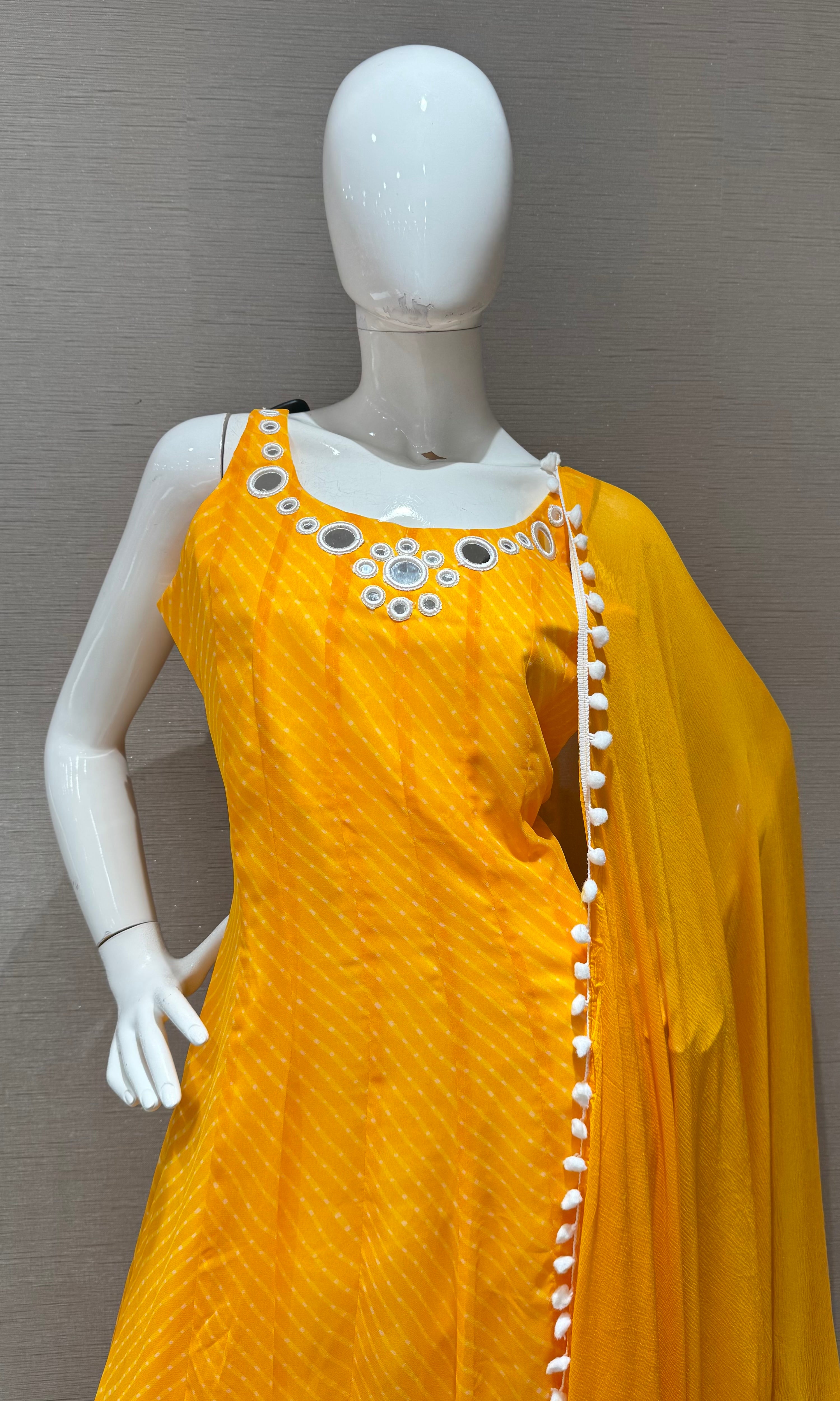 yellow bandhani print and intricate mirror anarkali set
